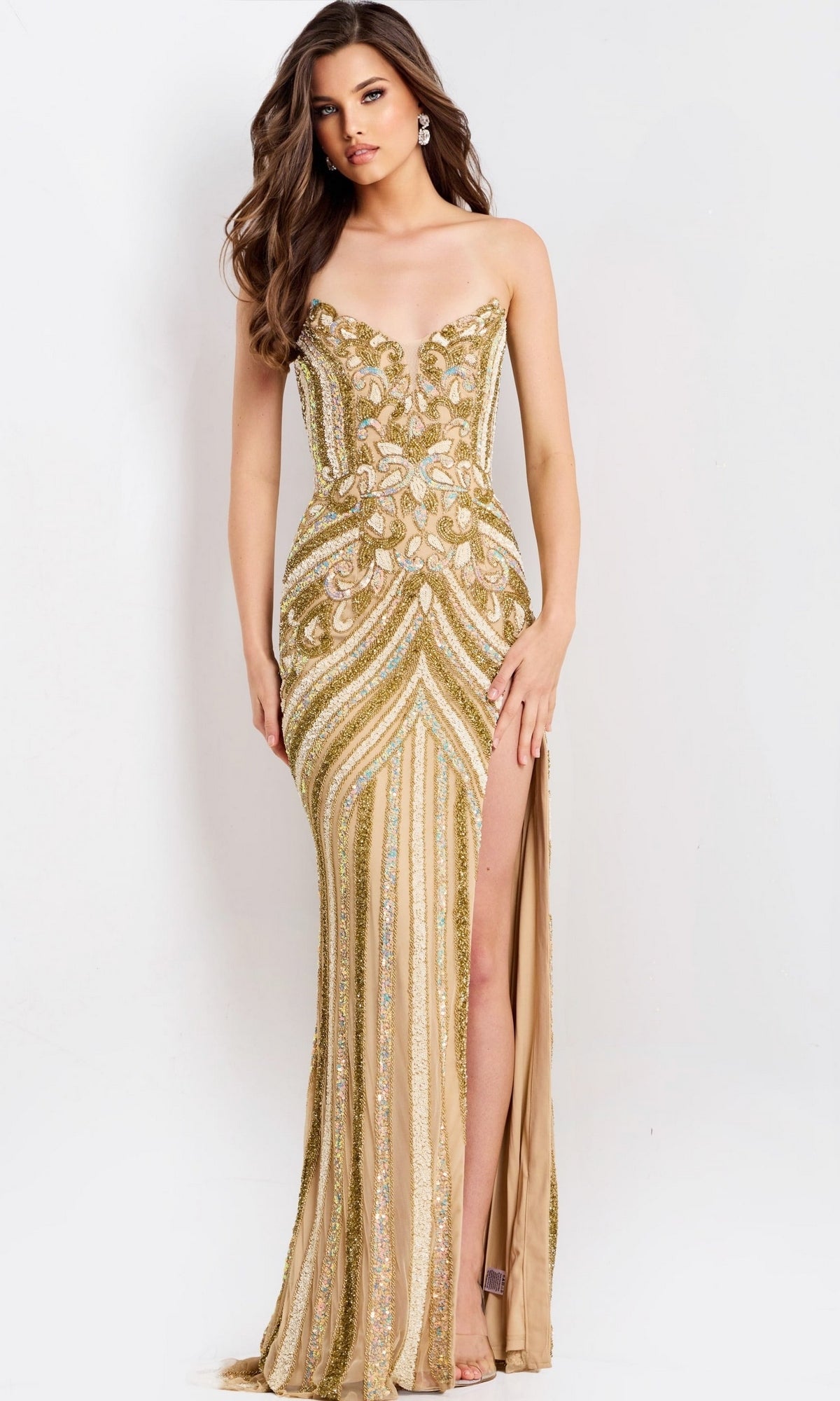 Jovani 38707 strapless, floor-length gold gown featuring intricate vertical beadwork and a high leg slit in a fitted formal dress silhouette.