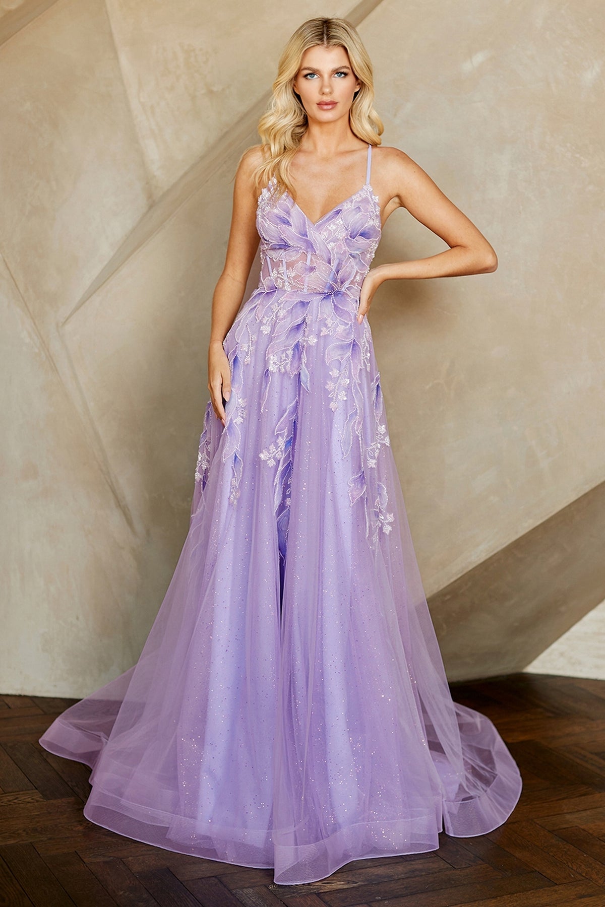 Amelia Couture 4073 lilac A-line prom dress featuring a sheer bodice, thin straps, and floral embroidery on a glitter tulle skirt.