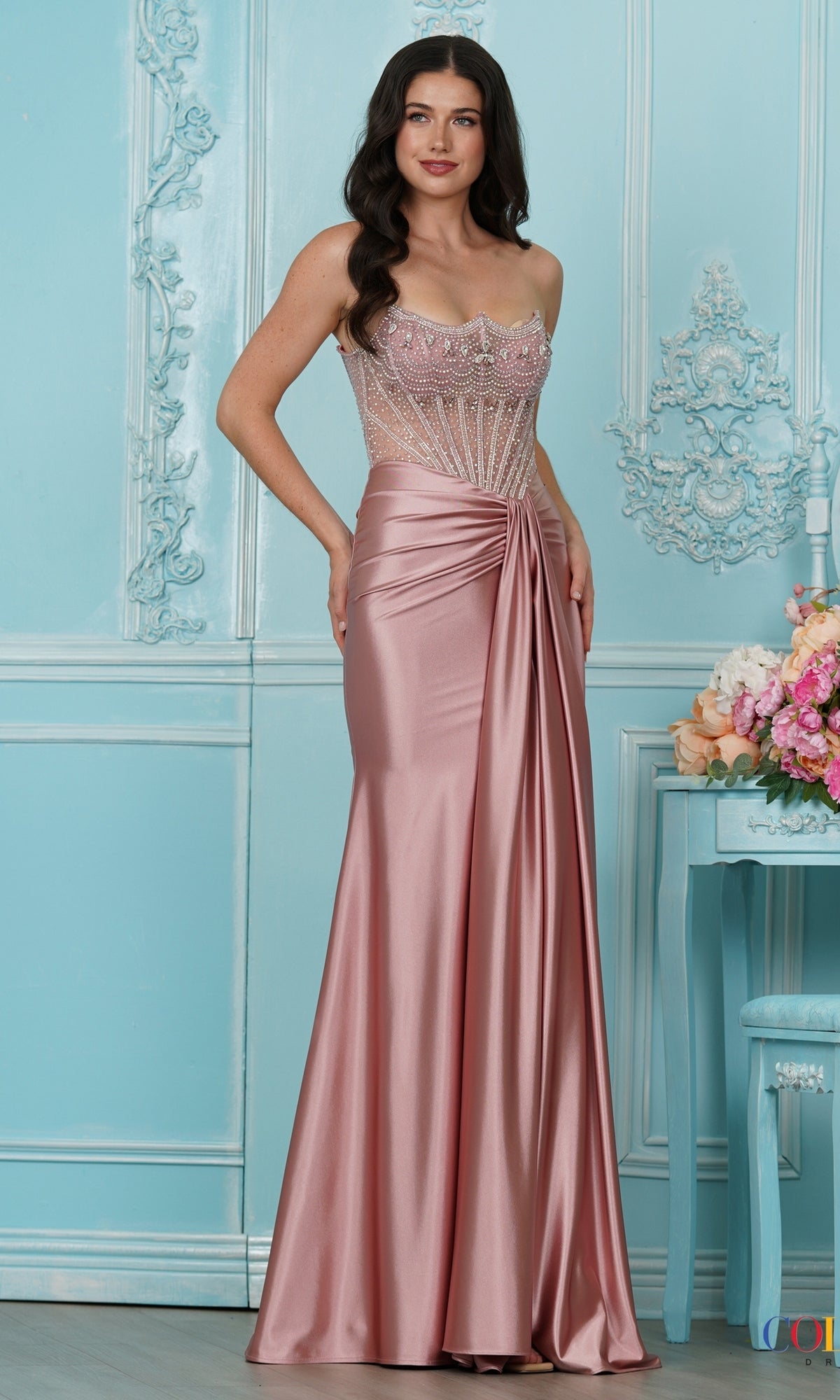 Rose-colored Long Prom Dress: Colors Dress 4080 floor-length beaded gown featuring a sheer, beaded corset bodice and a draped satin skirt.