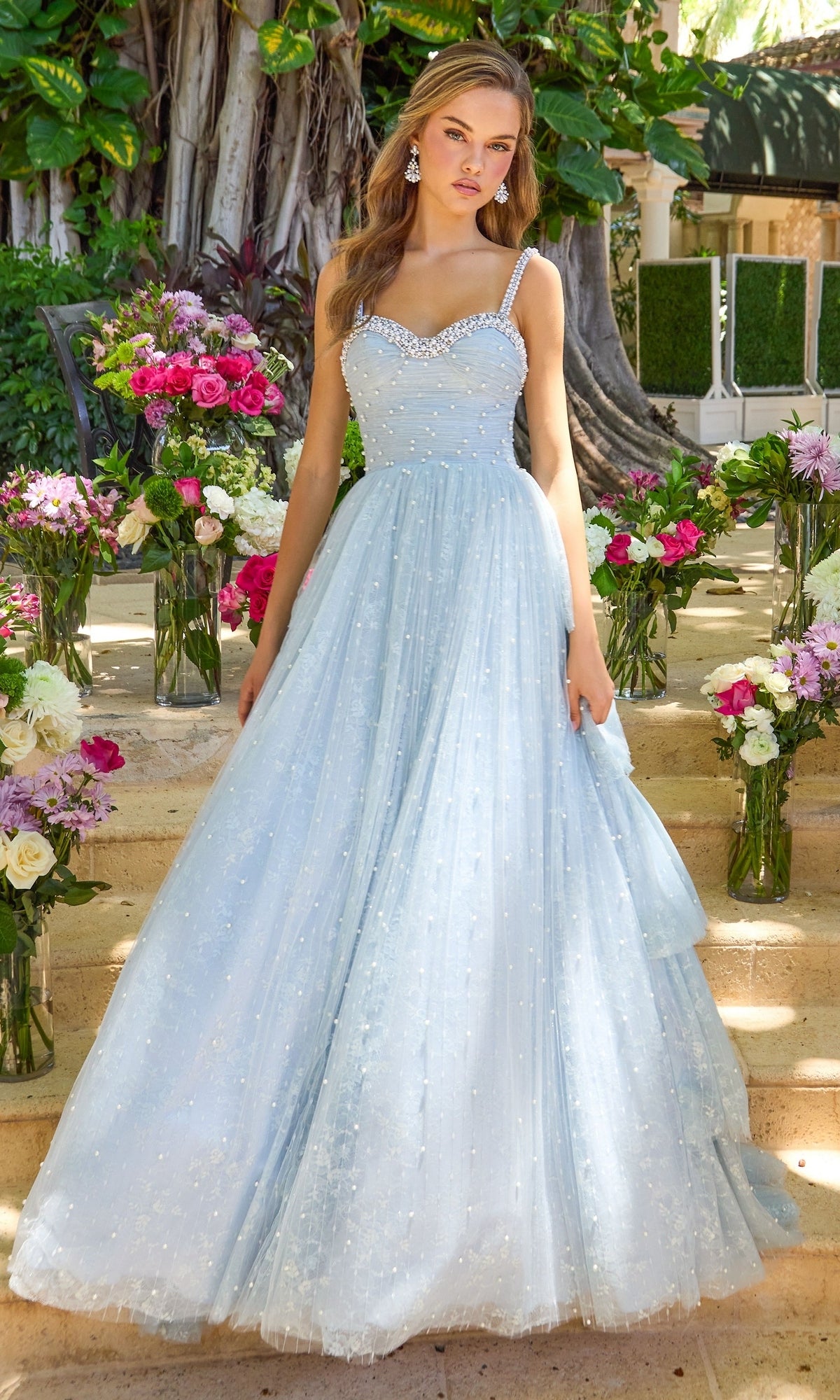 Long Prom Dress: Ava Presley 42526 light blue floor-length ball gown with a sweetheart neckline, beaded straps, and scattered pearl embellishments.