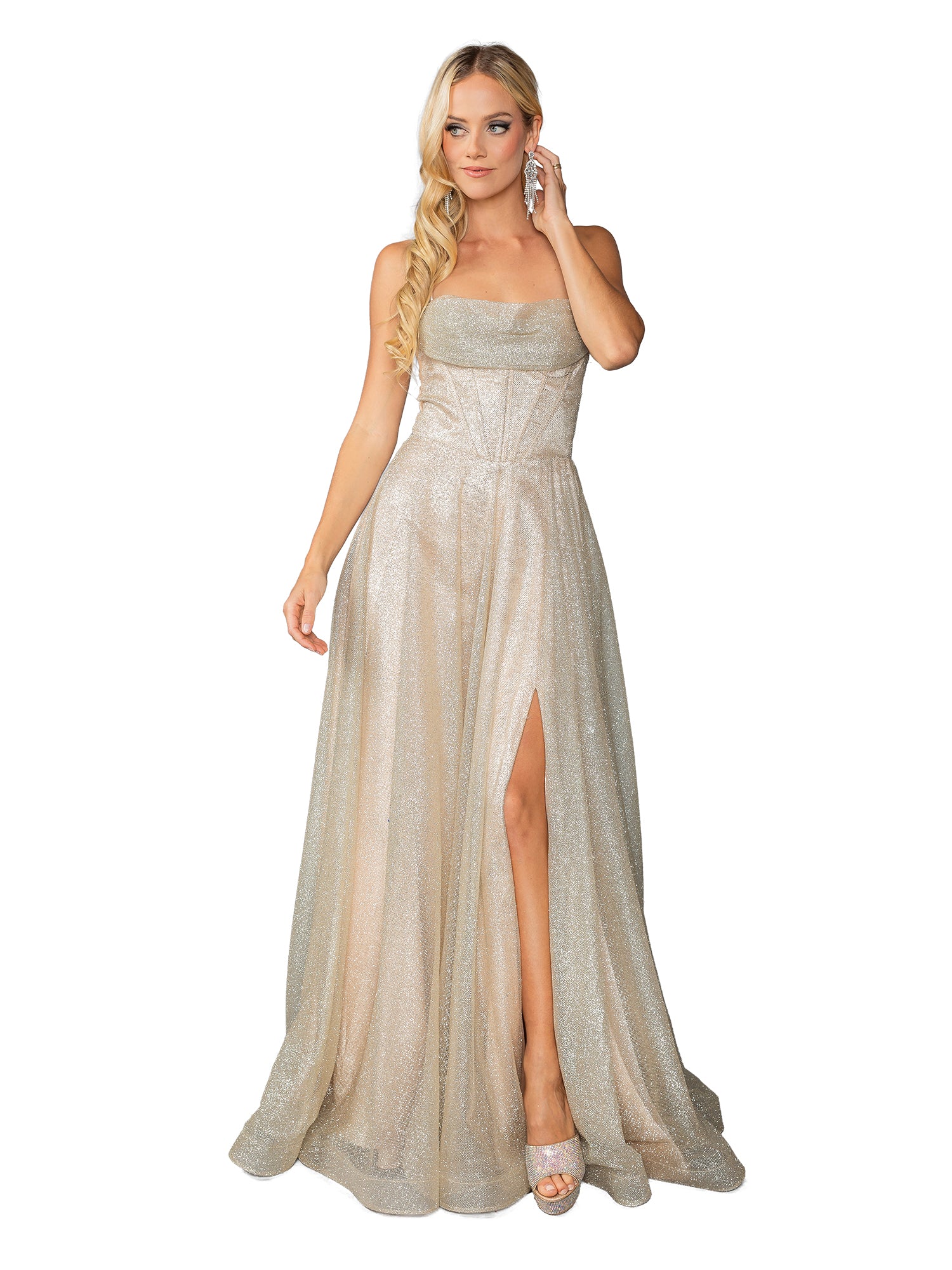 A woman models the Dancing Queen 4428 Long Glitter Prom Ball Gown—a strapless, champagne floor-length dress with a high slit—against a white background.