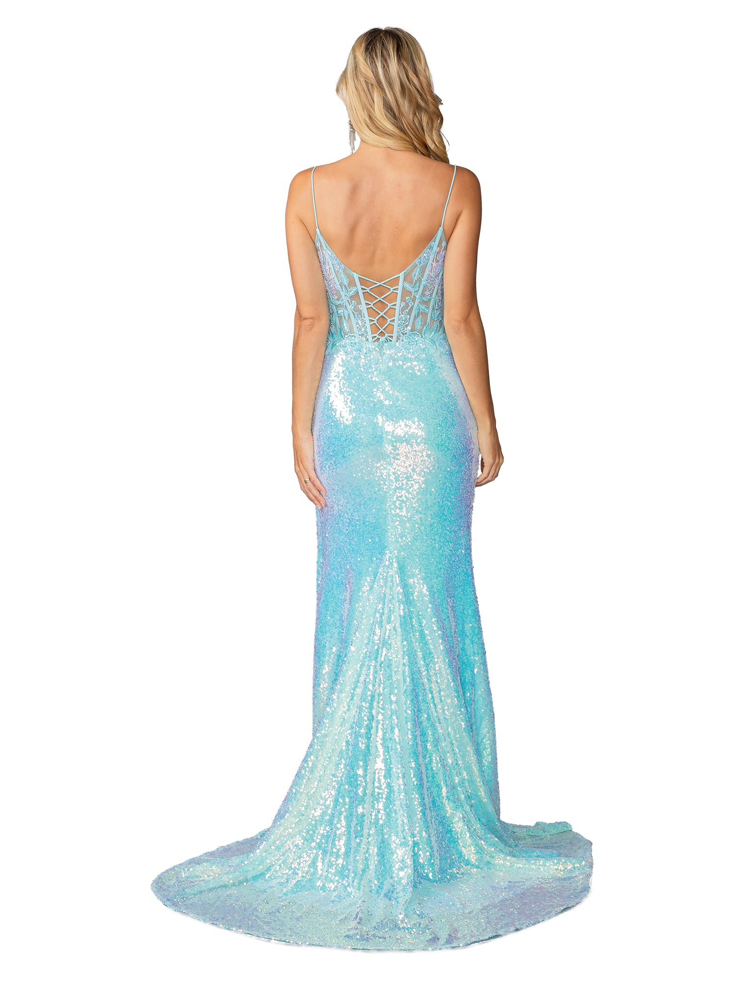 A woman stands with her back to the camera wearing the Lace-Up Long Sequin Prom Dress: Dancing Queen 4435, a floor-length light blue gown with thin straps and a lace-up back.