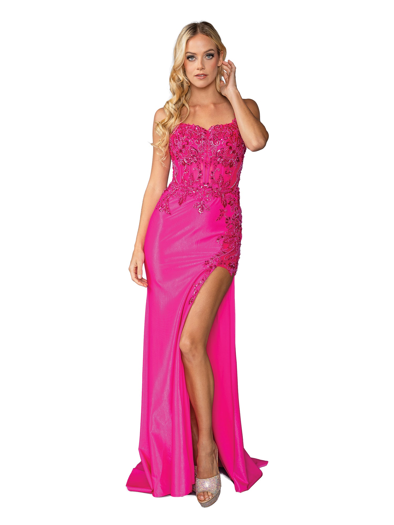 A woman models the Long Sequin-Print Prom Dress: Dancing Queen 4436, a bright pink strapless gown with lace details and a thigh-high slit, standing against a white background—perfect for prom or any formal occasion.