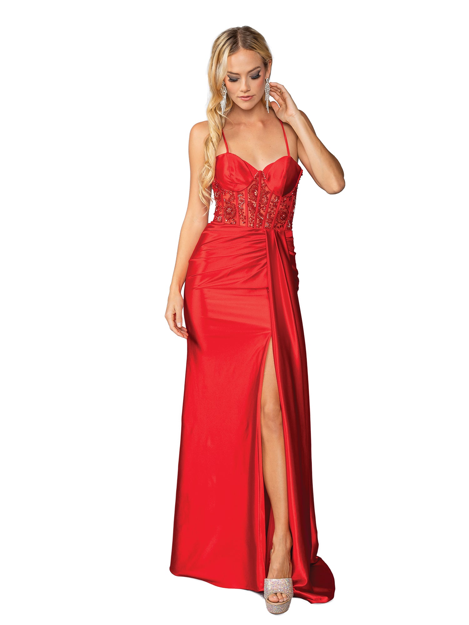 A woman stands against a white background wearing the Drape-Front Long Prom Dress: Dancing Queen 4439, featuring spaghetti straps, a beaded bodice, lace-up back, and thigh-high slit.