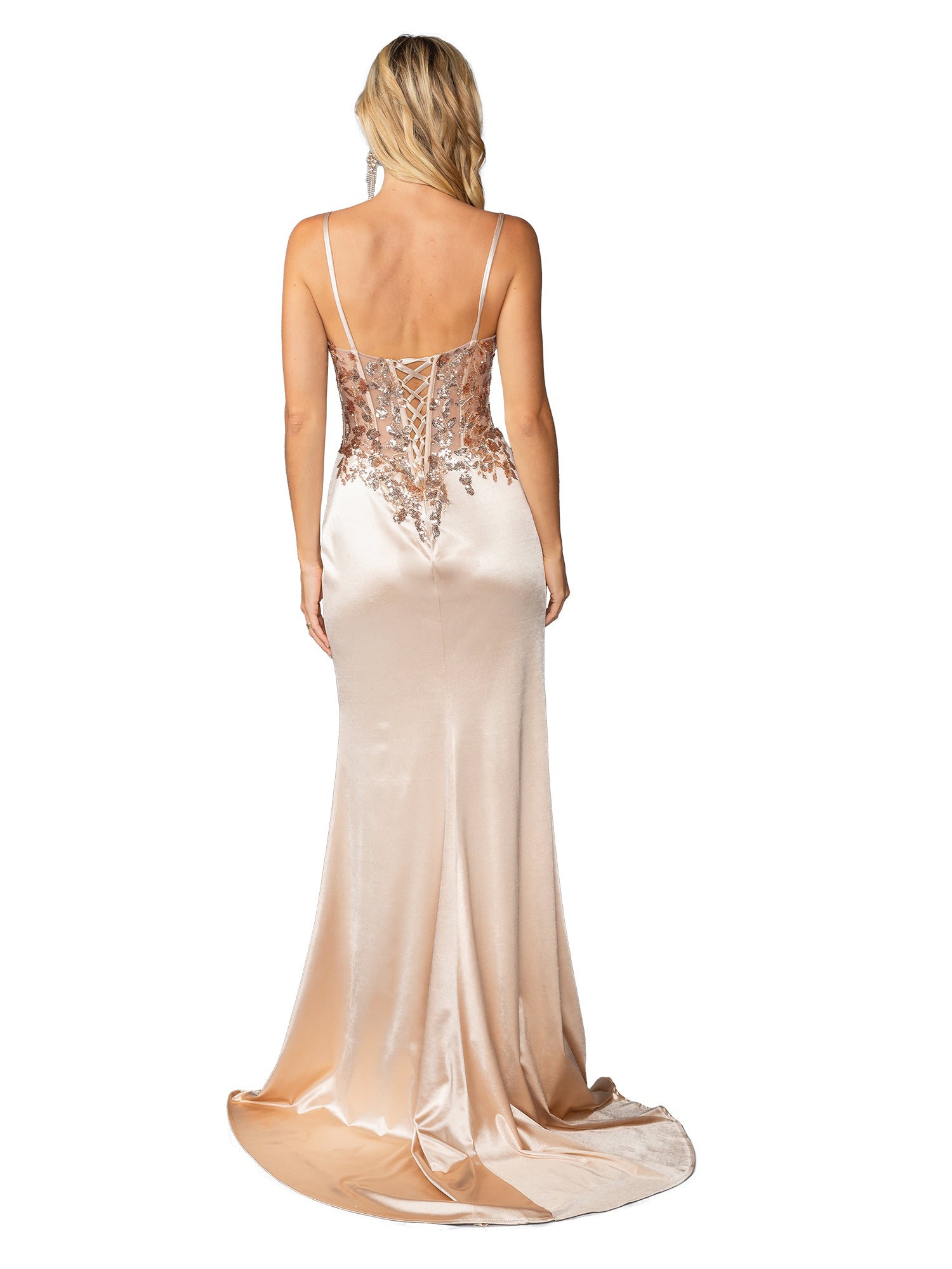 A woman is shown from the back wearing the Long Champagne Prom Dress: Dancing Queen 4443, a floor-length satin gown with thin straps and a detailed sequin corset bodice.