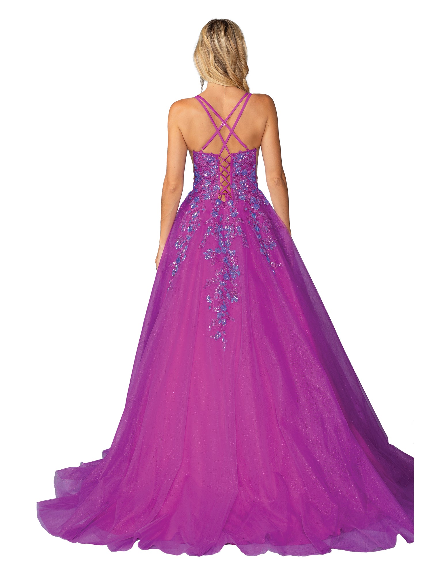 A blonde woman models the Dancing Queen 4460 long magenta prom ball gown, featuring a lace-up back, crisscross straps, blue floral embellishments, and sequin embroidery, shown from behind against a white background.