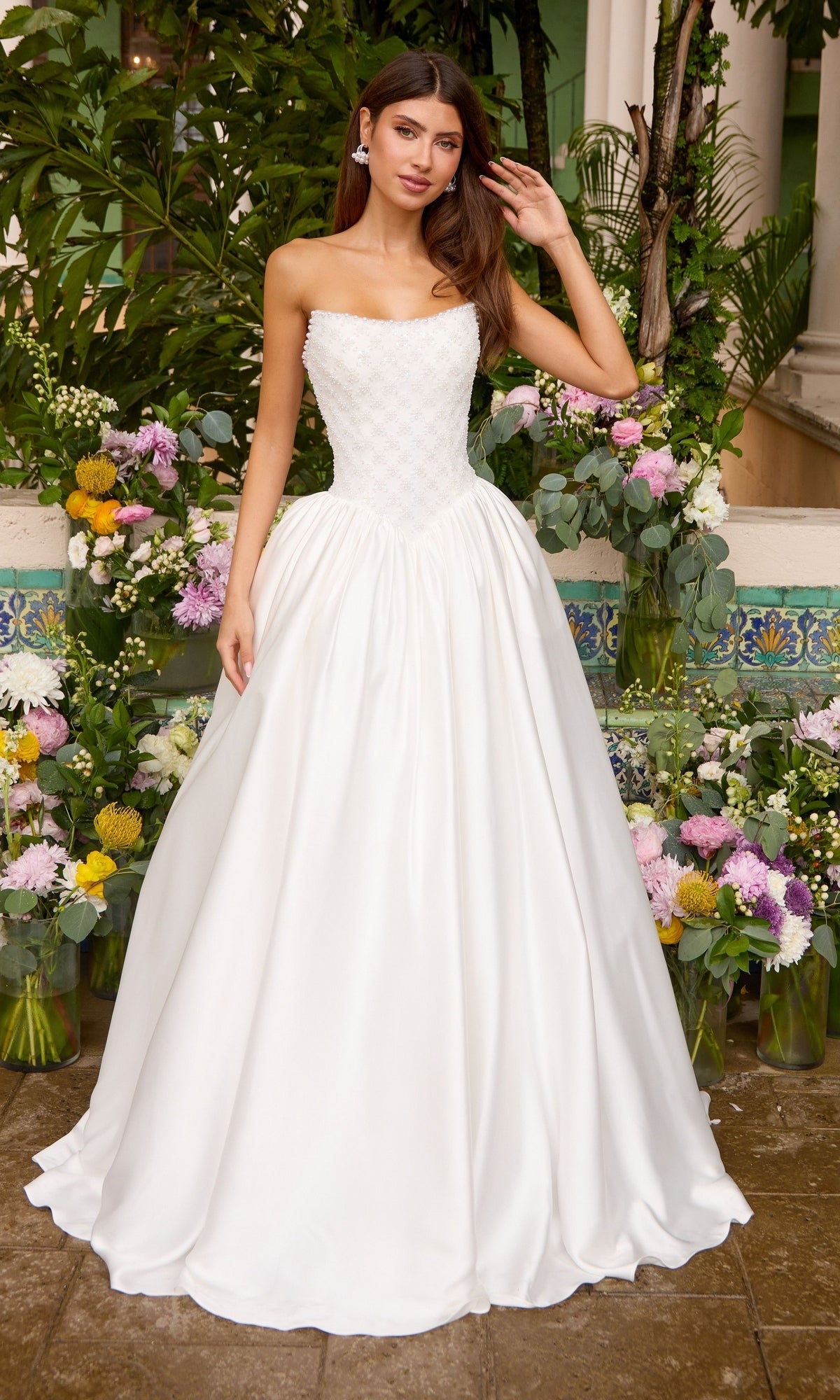 Strapless ivory floor-length Ava Presley 47364 ball gown featuring a beaded bodice and a full skirt.