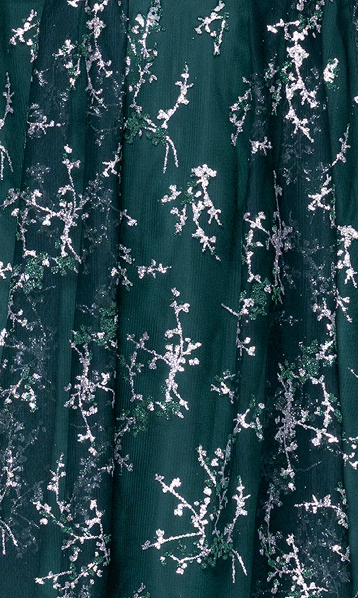 Close-up of Plus Short Green Hoco Dress: Blondie Nites 4884BNW—dark green fabric with silver floral embroidery and sheer overlay, ideal for an affordable cocktail or plus-size homecoming dress.