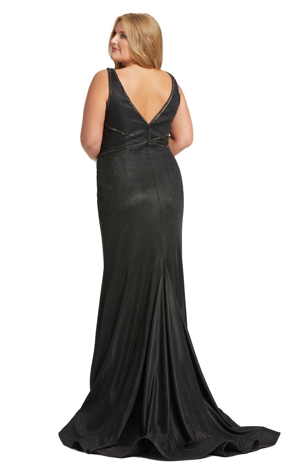 A woman stands facing away from the camera in the Long Plus-Size Prom Dress 48895 by Mac Duggal—a floor-length, sleeveless black shimmering gown with a deep V-back.