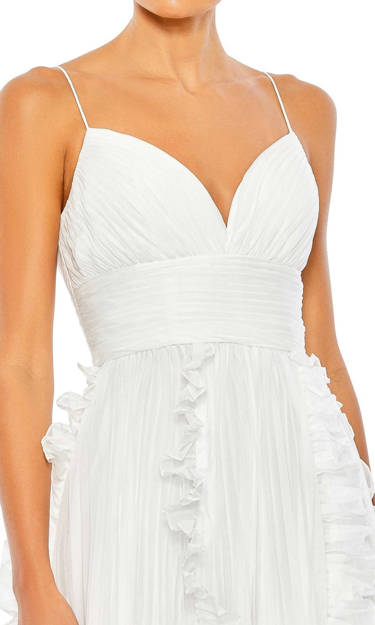 A woman wearing the Ruffled Long White Formal Dress 49533, featuring thin straps, a fitted waist, pleated fabric, and ruffle details.