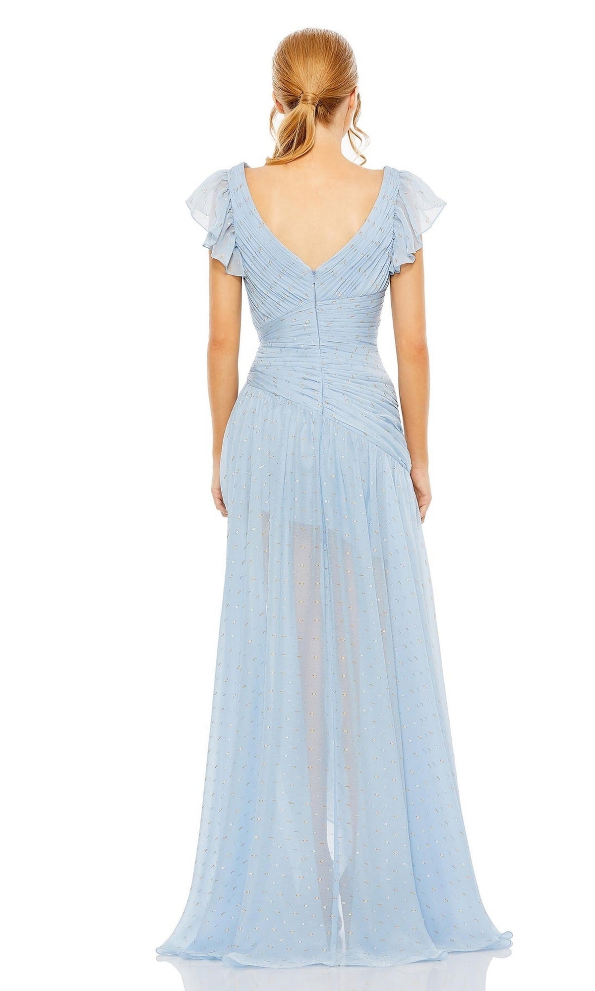 A woman with blond hair in a low ponytail stands facing away, wearing the Mac Duggal 49705 ice blue long formal dress featuring ruffled short sleeves and a V-shaped back.