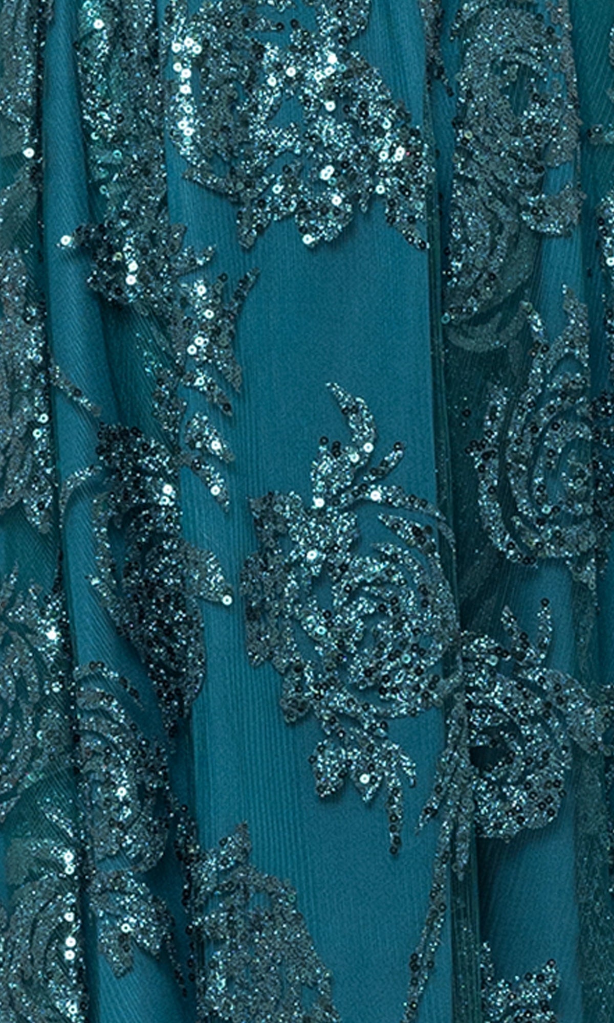 Close-up of the Cut-Out Short Teal Glitter-Print Hoco Dress 4997BN, showcasing dazzling sequin floral patterns on elegant fabric.
