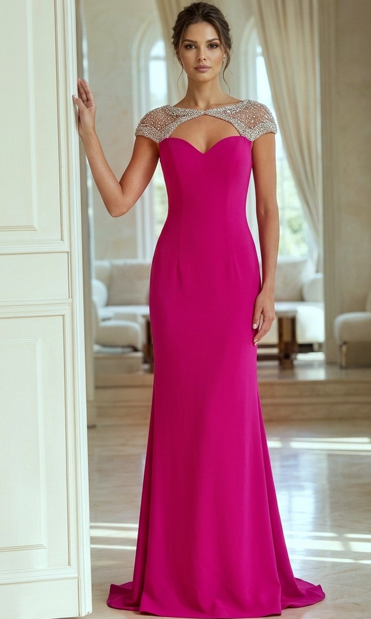 A woman in a stunning Jovani 50549 long formal dress—a floor-length, fuchsia gown featuring a sweetheart neckline and beaded cap sleeves—stands in an elegant, sunlit room with cream walls and large windows.