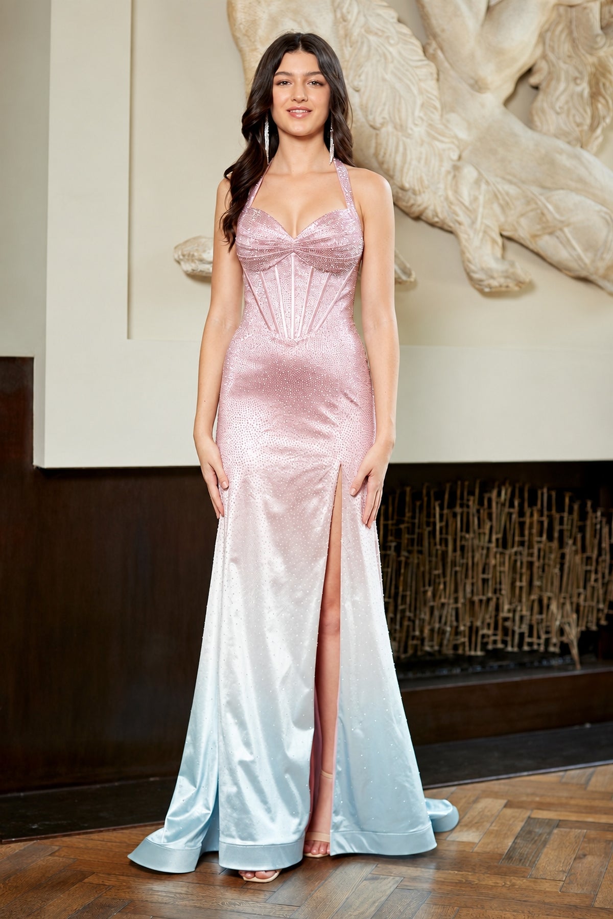 Amelia Couture 5091 long prom dress in a pink-to-blue ombre featuring a lace-up back, corset bodice, halter neckline, and side leg slit.