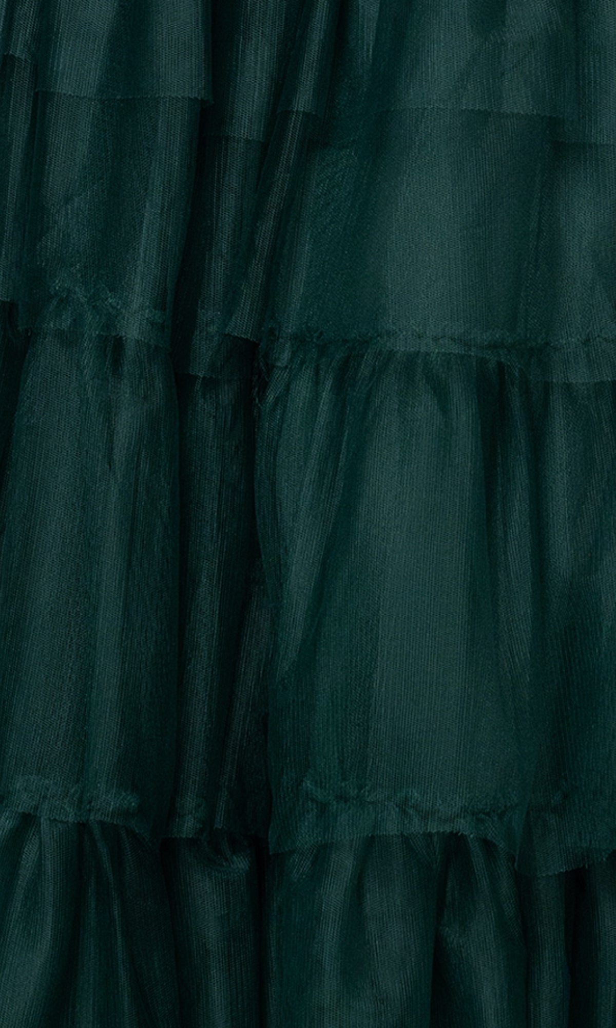 Close-up of the Blondie Nites 5183BN dark green tulle with sheer, textured layers and horizontal ruffled seams—ideal for an elegant long prom gown.
