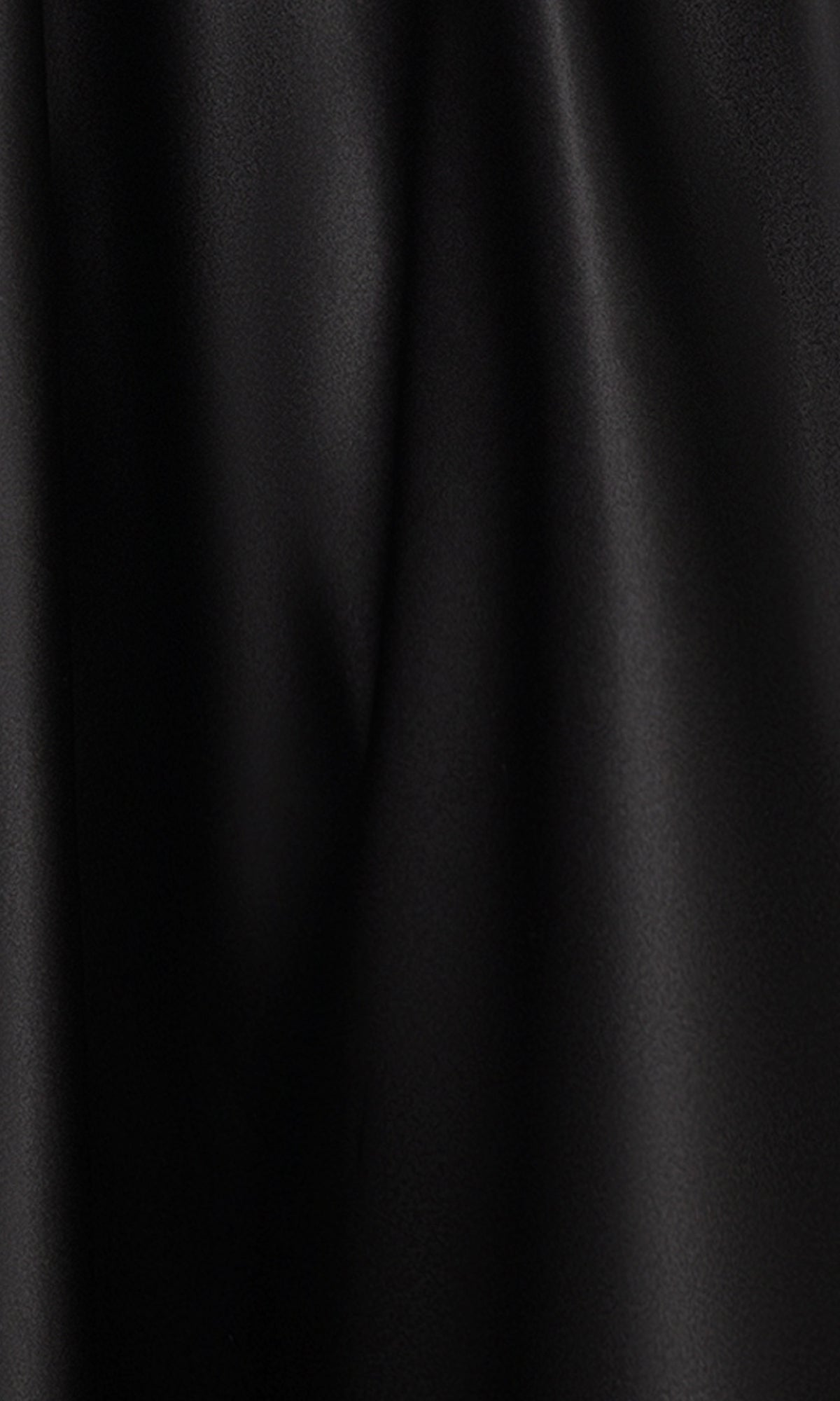 Close-up of smooth black satin fabric with visible folds and subtle sheen from the Long Prom Dress: Blondie Nites 5453BN, ideal for a corset bodice or elegant lace applique detailing.