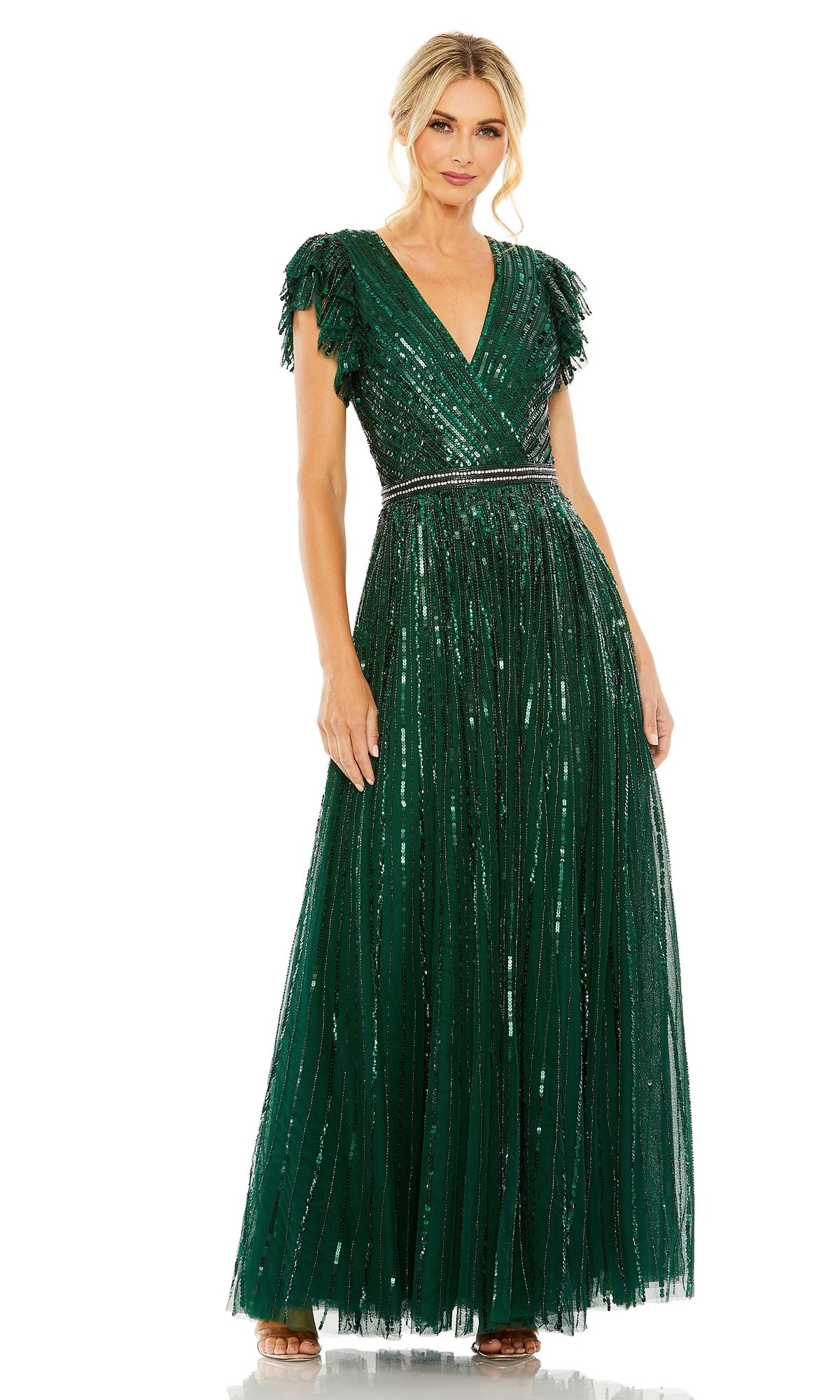 Woman in a floor-length Mac Duggal 5502 Sequin-Stripe Long Formal Dress, deep green with short fringed sleeves, V-neckline, and shimmering sequin stripes, standing against a white background.