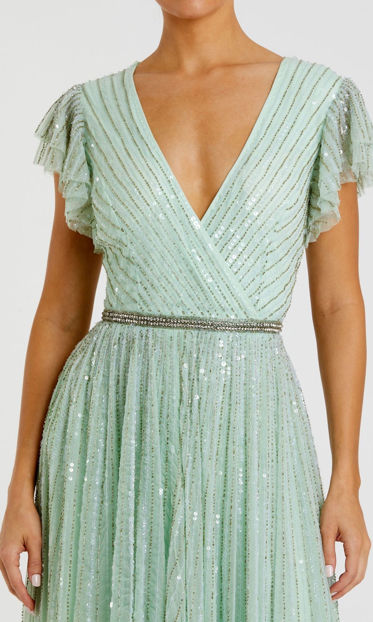 Woman wearing the Mac Duggal 5502 Sequin-Stripe Long Formal Dress, featuring light green sequins, a V-neck, short sleeves, pleated details, and a beaded waistband for an elegant formal look.