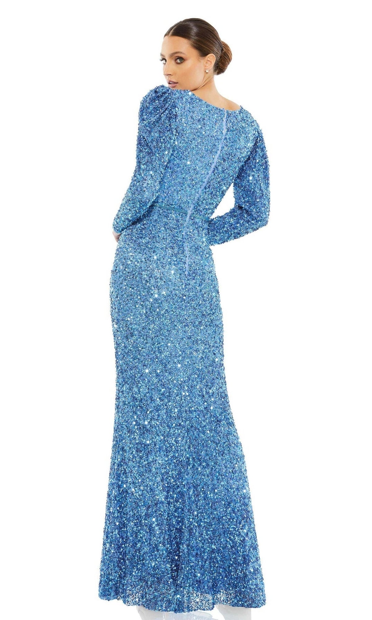Woman shown from the back wearing the Mac Duggal 5510 Long Sleeve Sequin Formal Dress, a fitted, floor-length blue gown, against a plain white background.