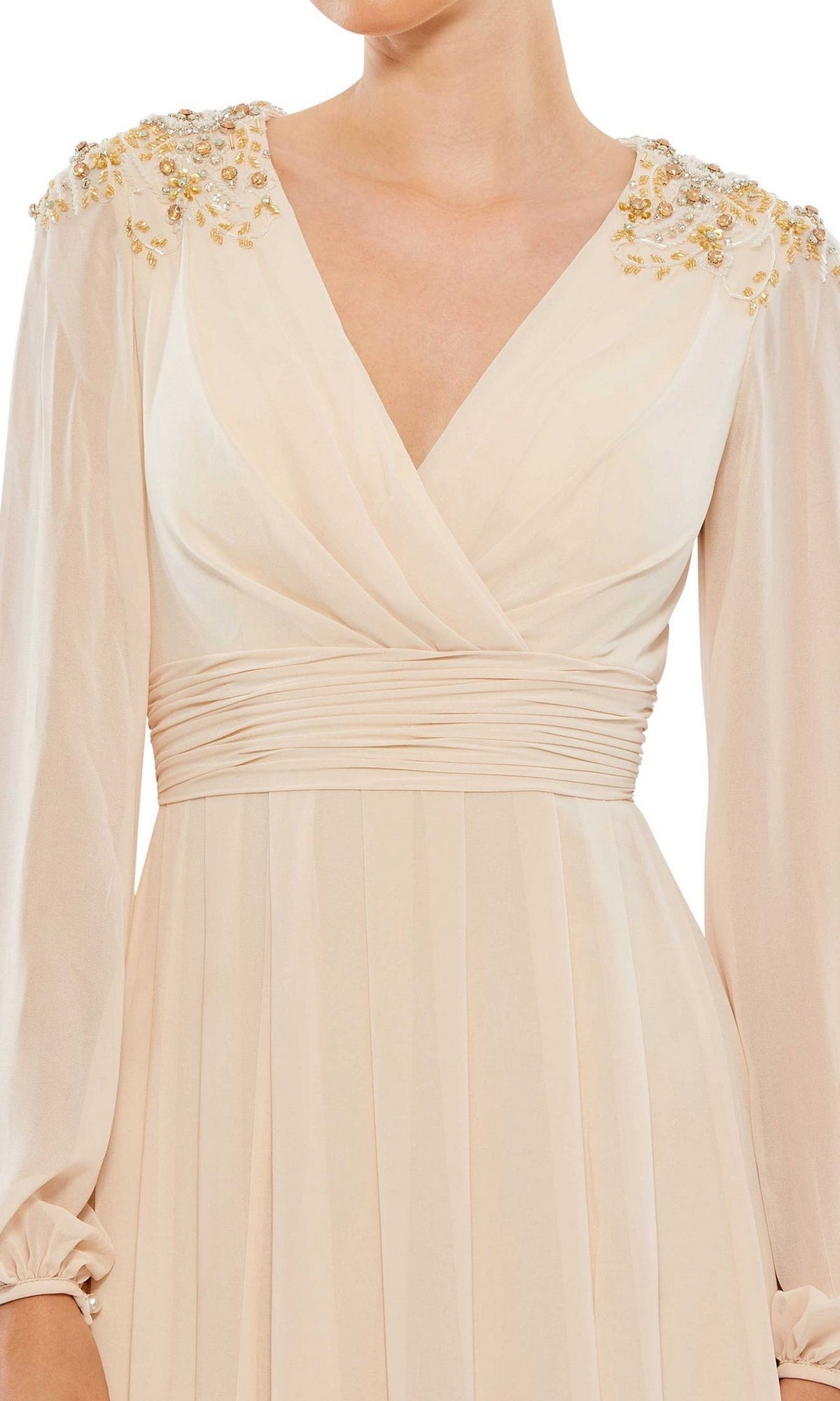 A woman wearing the Mac Duggal 55694 long sleeve chiffon formal dress in cream, with pleated waist and floral-embellished shoulders.