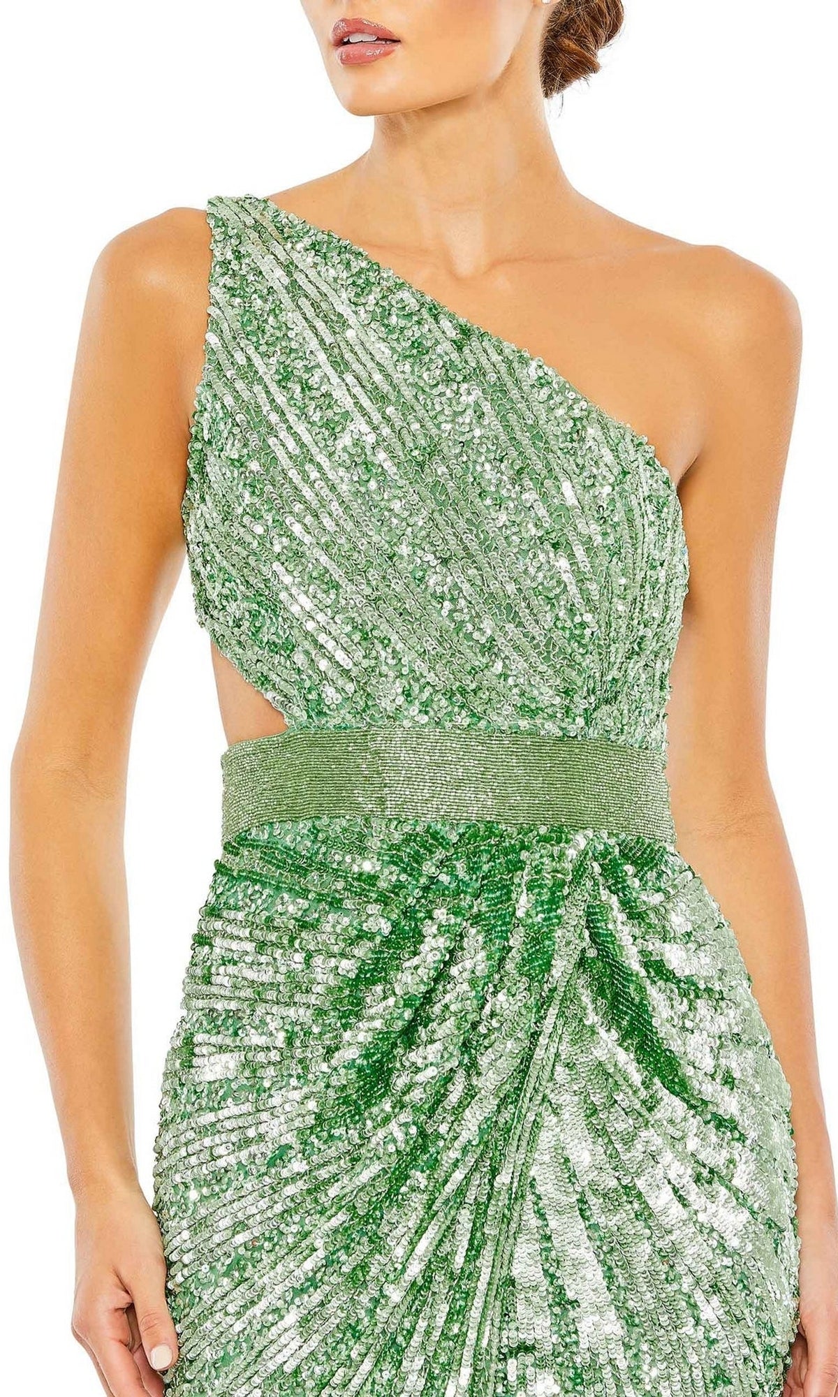 A woman wearing the Mac Duggal 5687: a green one-shoulder sequin formal dress featuring a waist cut-out and a gathered, draped skirt.