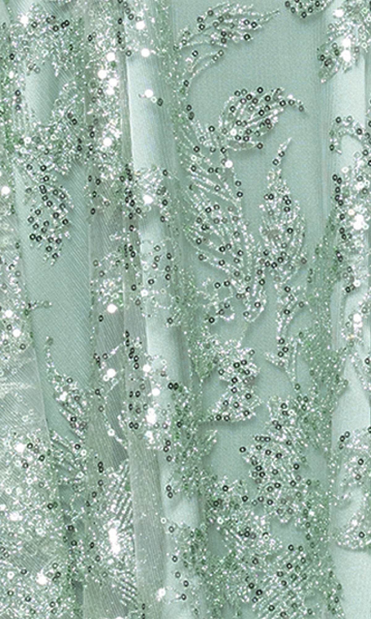 Close-up of the Mini Green Sequin Hoco Dress: Blondie Nites 5705BN, showing sage green fabric with intricate embroidery and sparkling sequins in a leafy design.