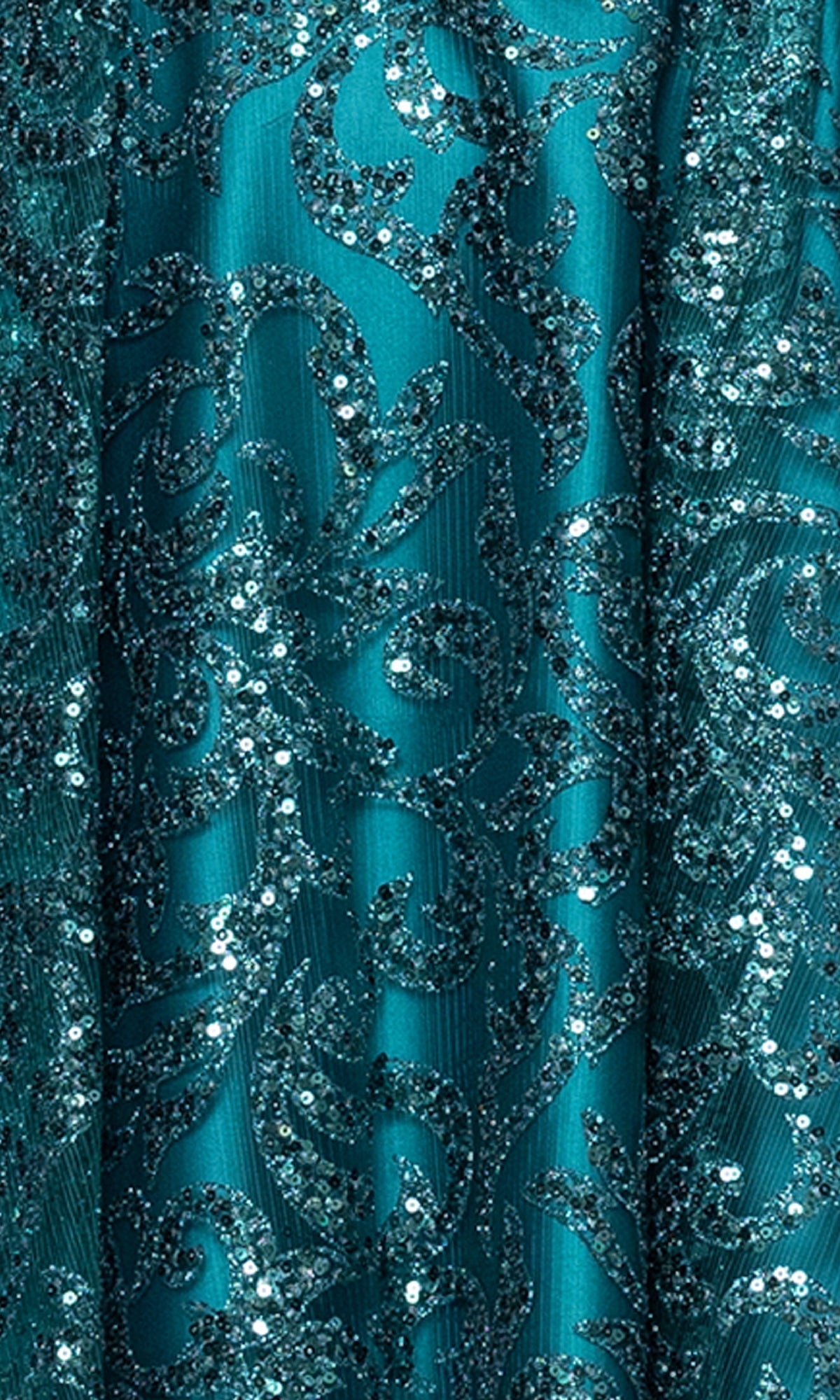 Close-up of the Mini Teal Glitter Hoco Dress Blondie Nites 5802BN, showcasing teal fabric adorned with swirling sequin and glitter patterns for a shiny, textured decorative surface.