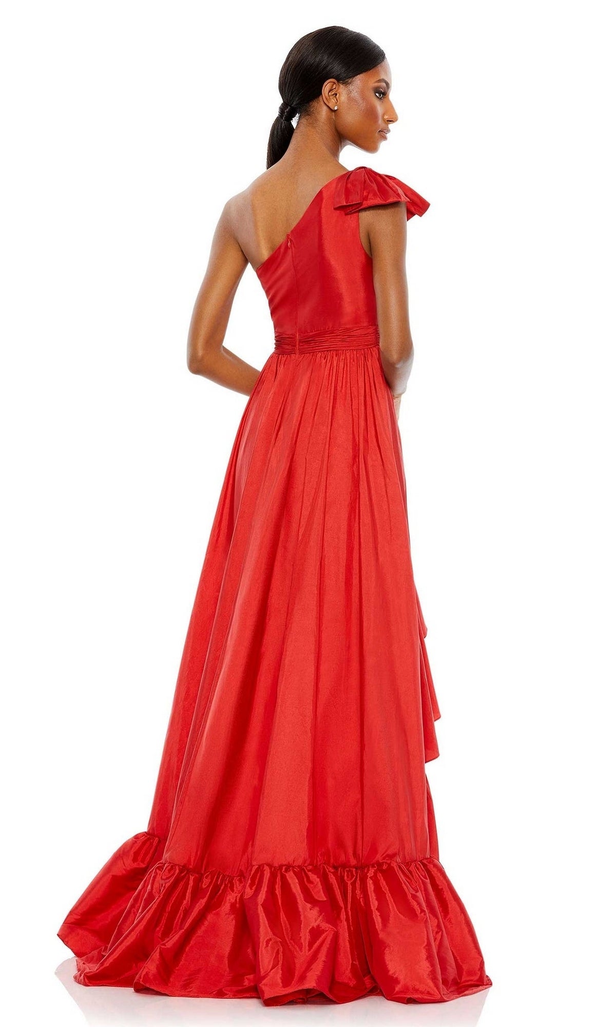 A woman models the Long Formal Dress 68027 by Mac Duggal in red, featuring a floor-length, one-shoulder design with ruffle accents, photographed from the back against a plain white background.