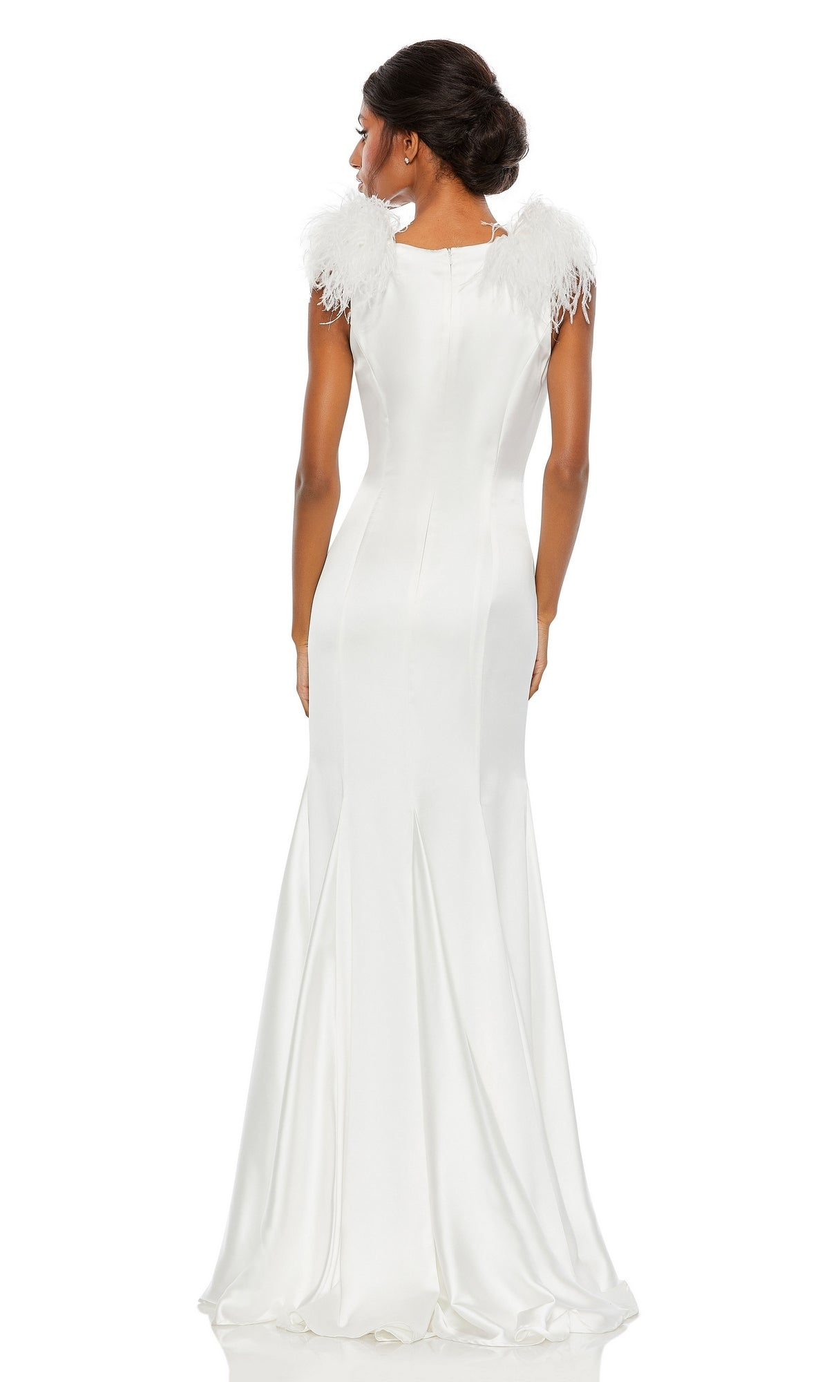 A woman is seen from the back wearing the Long Formal Dress 68137 by Mac Duggal—a white, floor-length gown with feathered shoulder accents and elegant feather trim—set against a plain white background.