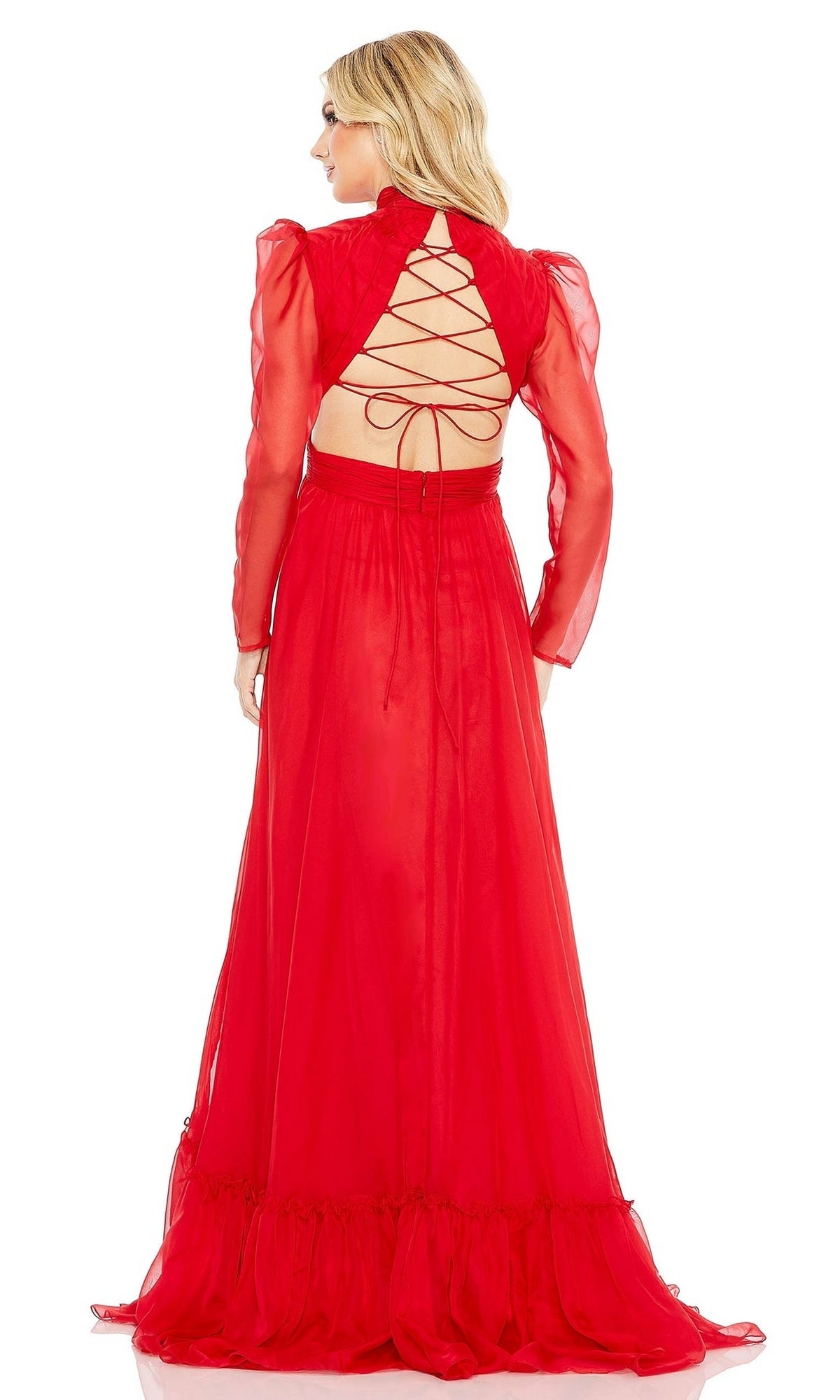 A woman stands facing away in the Long Formal Dress 68400 by Mac Duggal, a sheer red chiffon gown with long sleeves and an open back featuring crisscross lacing.