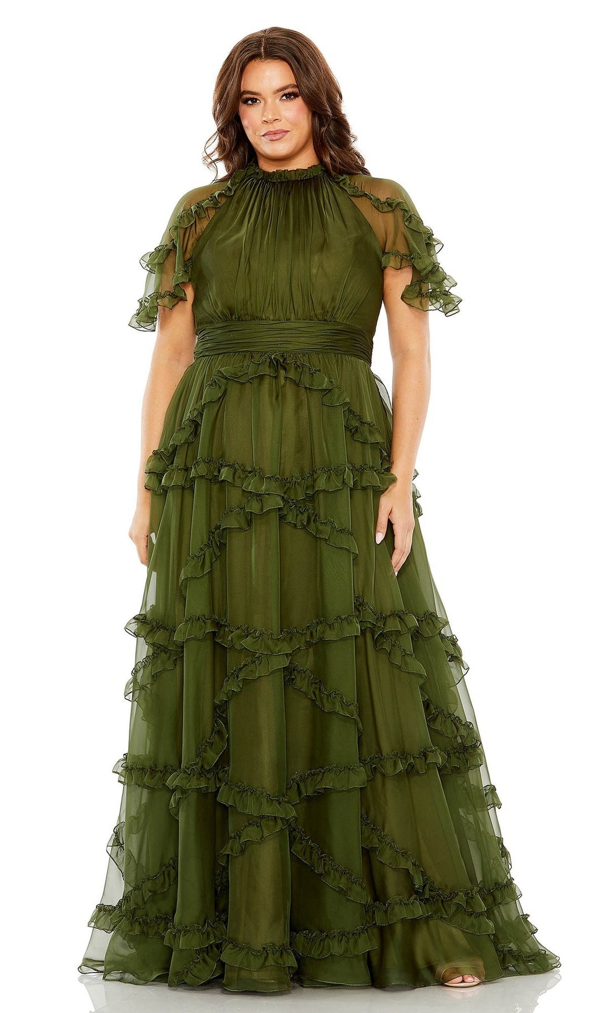 A woman wearing the Long Plus-Size Prom Dress 68424 by Mac Duggal, a floor-length, olive green gown with short sleeves and layered ruffle tiers in sheer fabric.