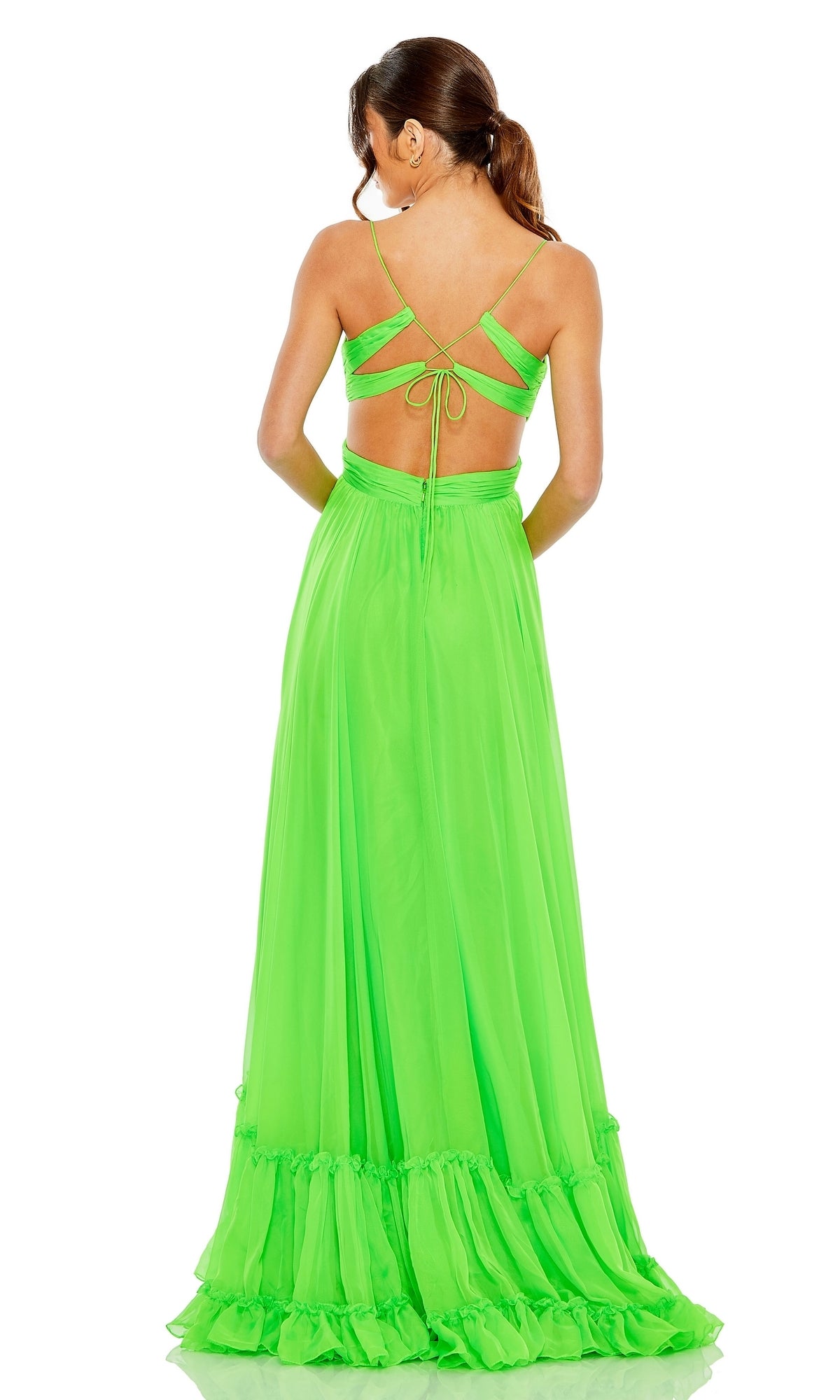 Woman wearing the Long Formal Dress 68477 by Mac Duggal in bright lime green, featuring an open back with crisscross straps, stands facing away from the camera.