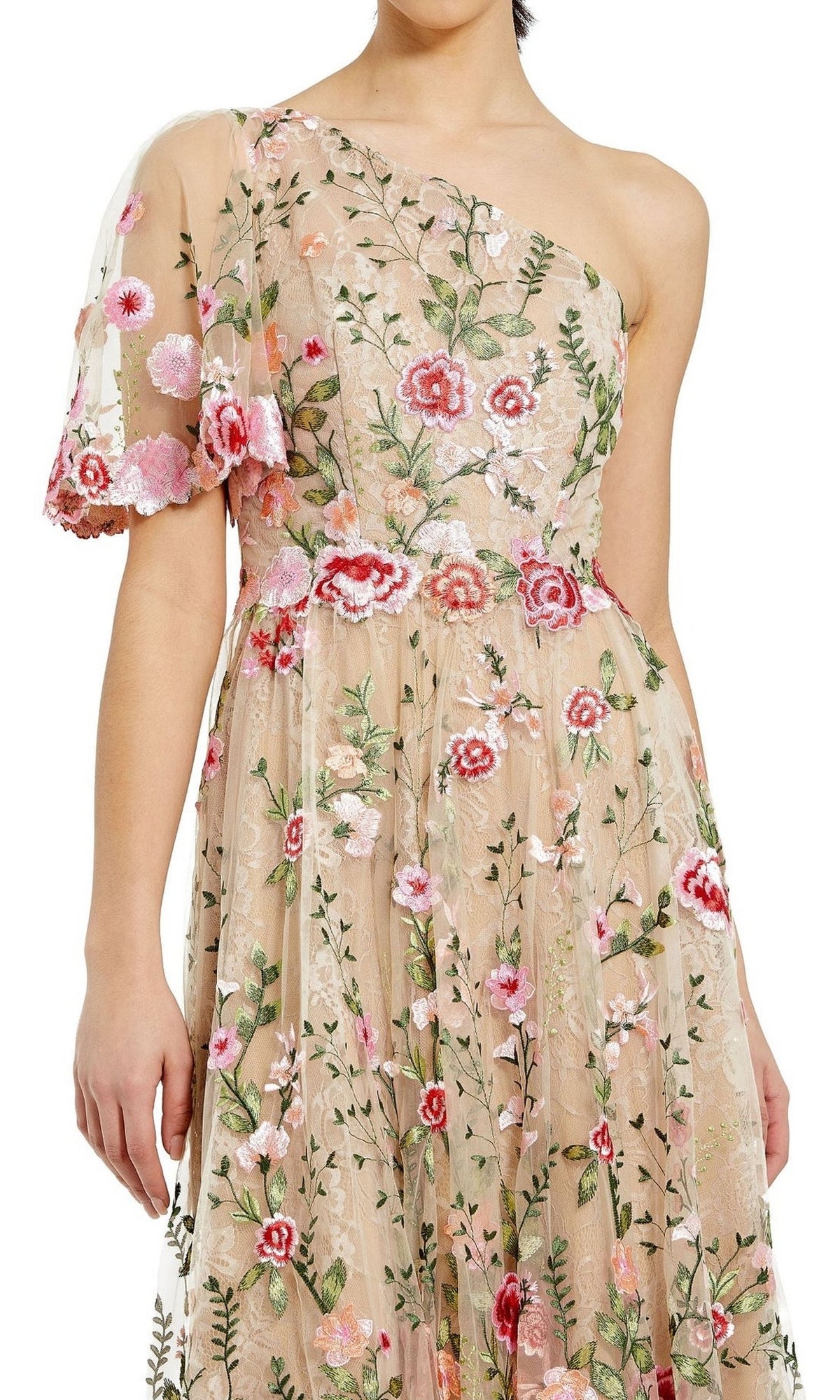 A woman wearing the Mac Duggal 68607 One-Shoulder Midi Party Dress, featuring sheer nude fabric, pink and green floral embroidery, a single short sleeve, and a chic tea-length silhouette.