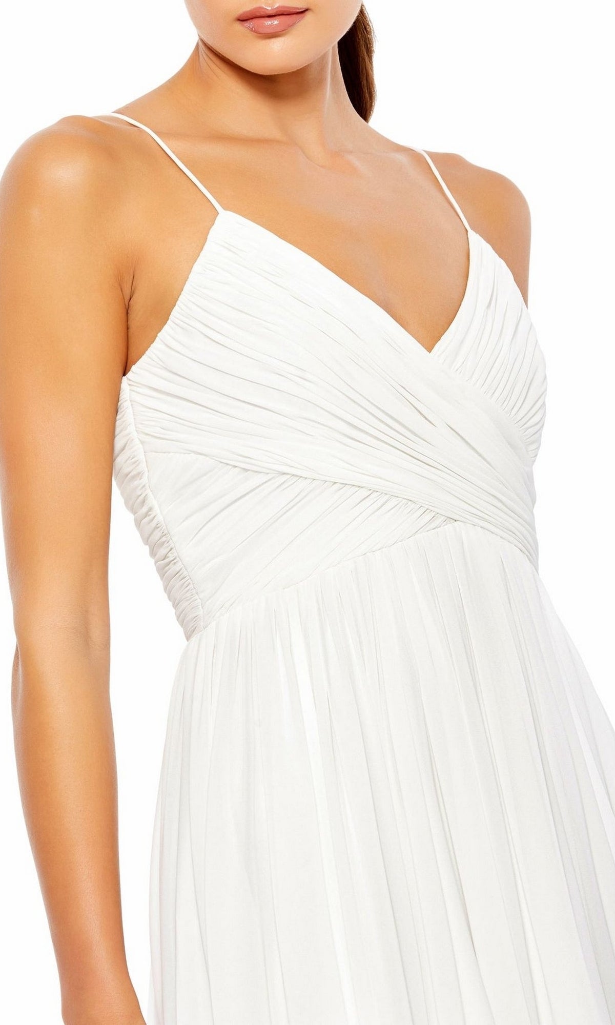 A woman wears the Mac Duggal 70099 A-Line Midi Wedding Guest Dress featuring a white, sleeveless design with thin straps and a pleated, wrap-style bodice.