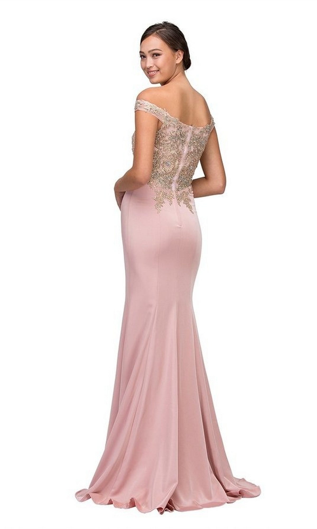 Woman in the Long Formal Dress: Eureka 7012 (Bur/Gd) with a fitted bodice and metallic lace applique, posing with a slight smile over her shoulder.