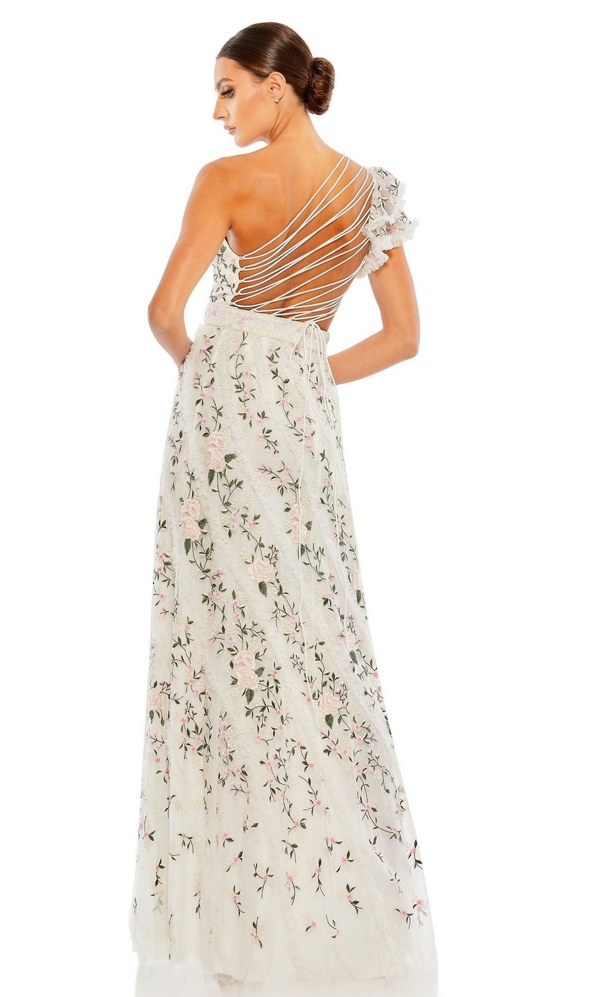 A woman stands facing away in the Long Formal Dress 70160 by Mac Duggal, featuring embroidery, a strappy open back, and a single ruffled shoulder.