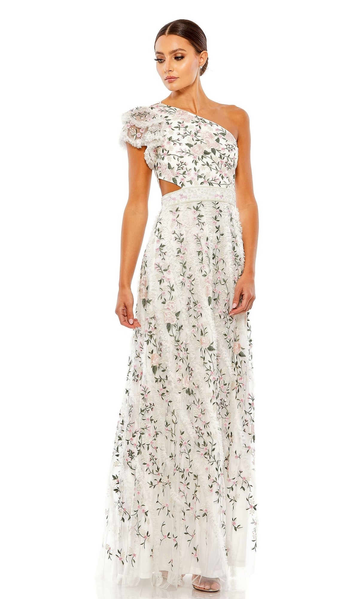 A woman models the Long Formal Dress 70160 by Mac Duggal—a white, floor-length, one-shoulder gown with floral embroidery and a cut-out waist—while standing against a plain white background.