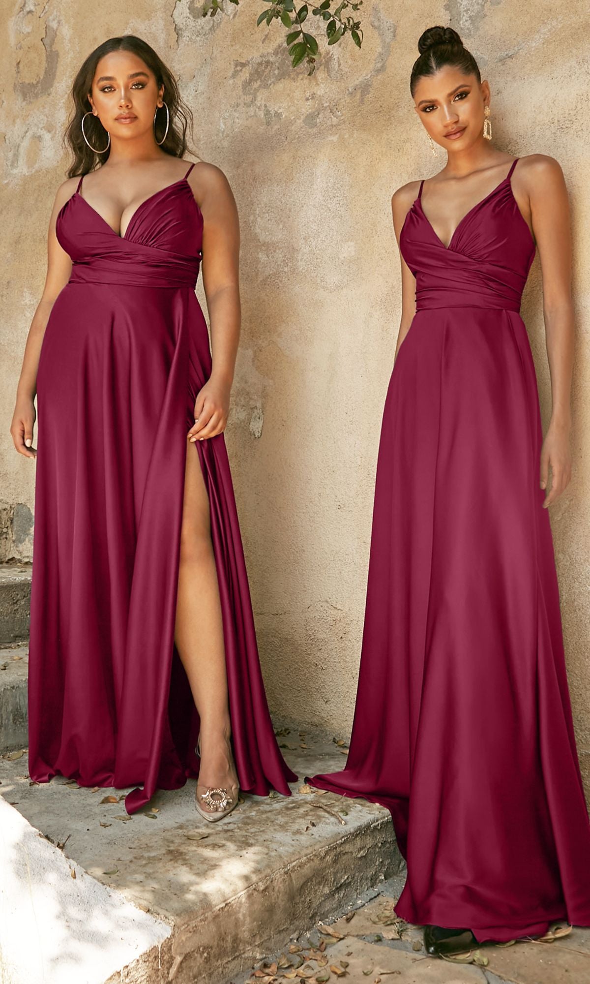 Two women stand side by side in floor-length, sleeveless Classic Long Satin Formal Prom Dress: Ladivine 7485 gowns with V-necklines and gathered waists against a textured beige wall.