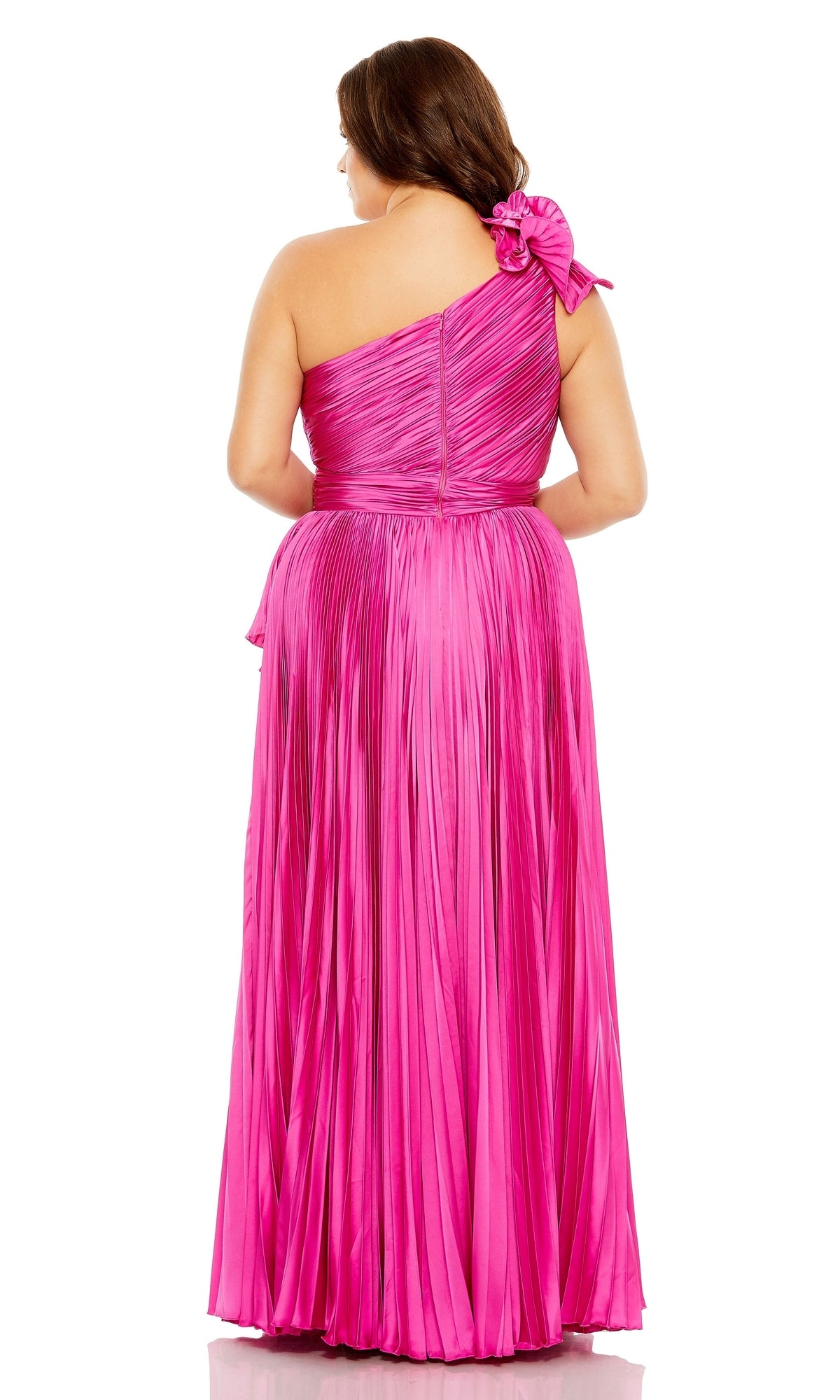 A woman wears the Long Plus-Size Formal Dress 77003 by Mac Duggal—a shiny, hot pink, one-shoulder pleated gown with a large bow on the shoulder—shown from the back, perfect as an A-line formal dress for special occasions.