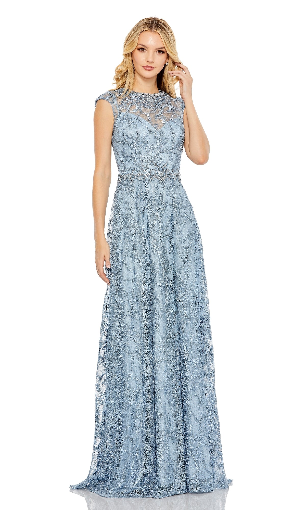 A woman stands facing forward against a plain white background, wearing the Mac Duggal 79430 Long Beaded-Lace Formal Dress—a floor-length, light blue gown featuring cap sleeves and a sheer neckline.