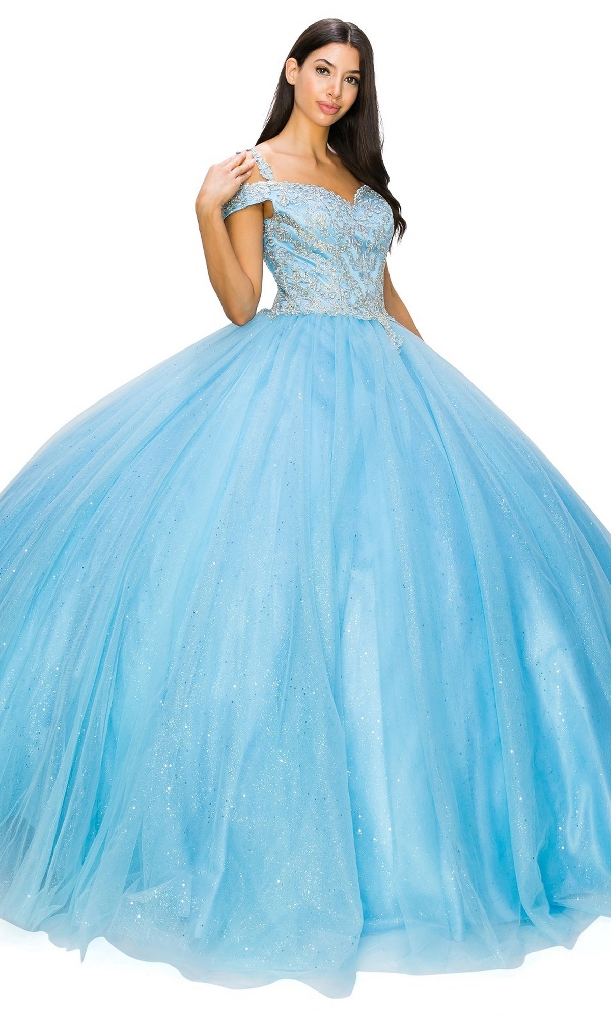 A woman wears the Quinceanera Ball Gown 8028J, a sparkling light blue off-the-shoulder dress with an embellished bodice and voluminous glitter tulle skirt.