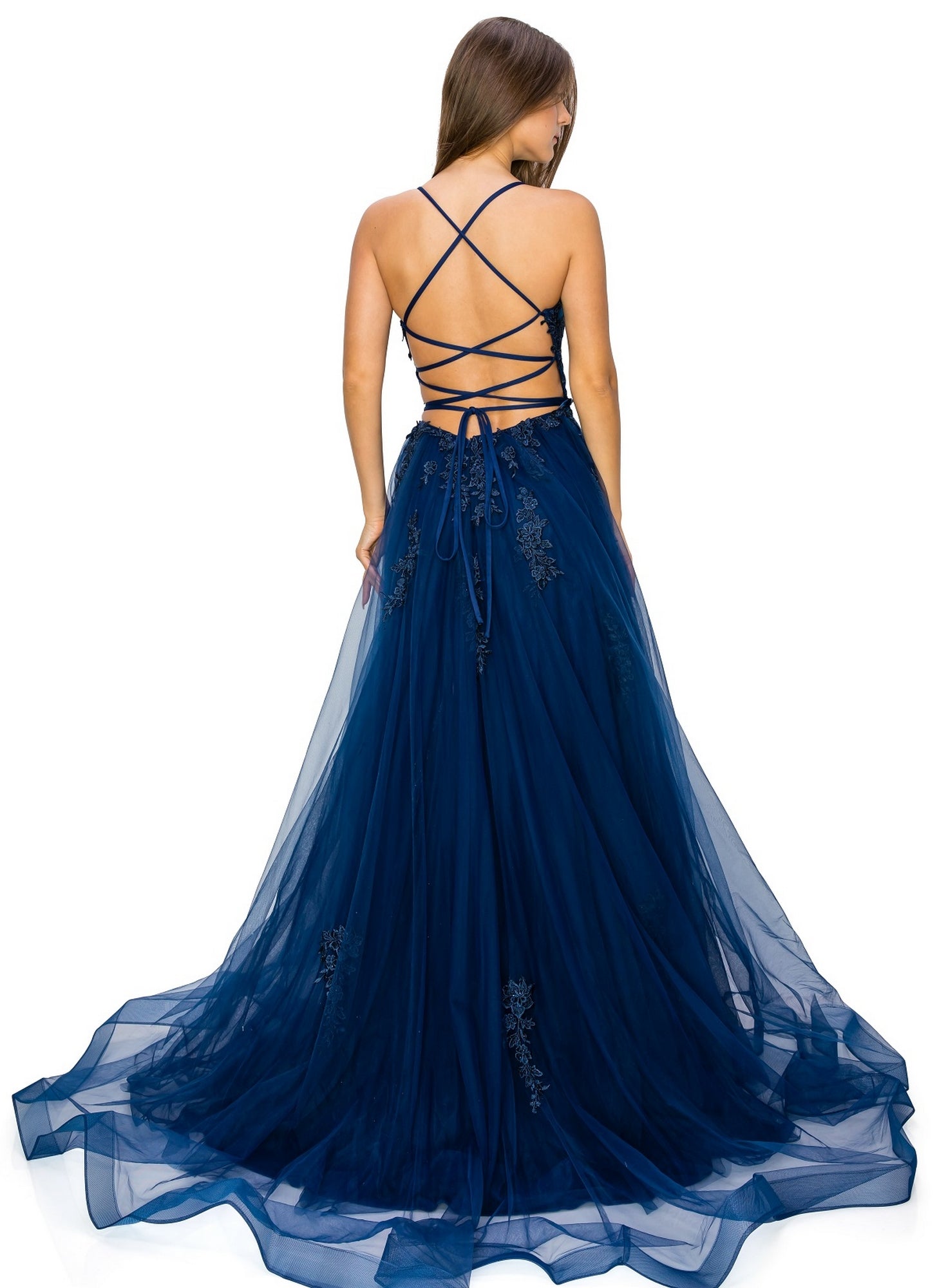 A woman stands facing away in the Floral-Embroidered Long Tulle Prom Dress 8031J, a floor-length navy gown with a full skirt, lace-up open back, and delicate floral embroidery.