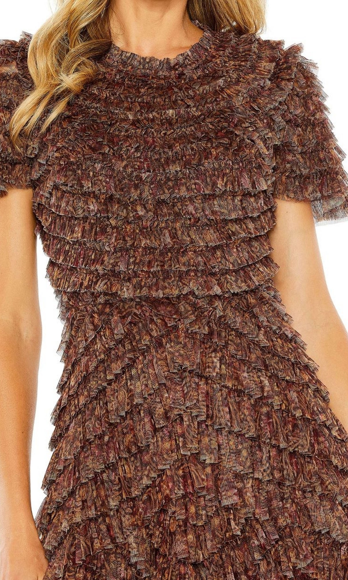 A woman wears the Mac Duggal 8042 long brown ruffled formal dress with layered, textured fabric and short sleeves.