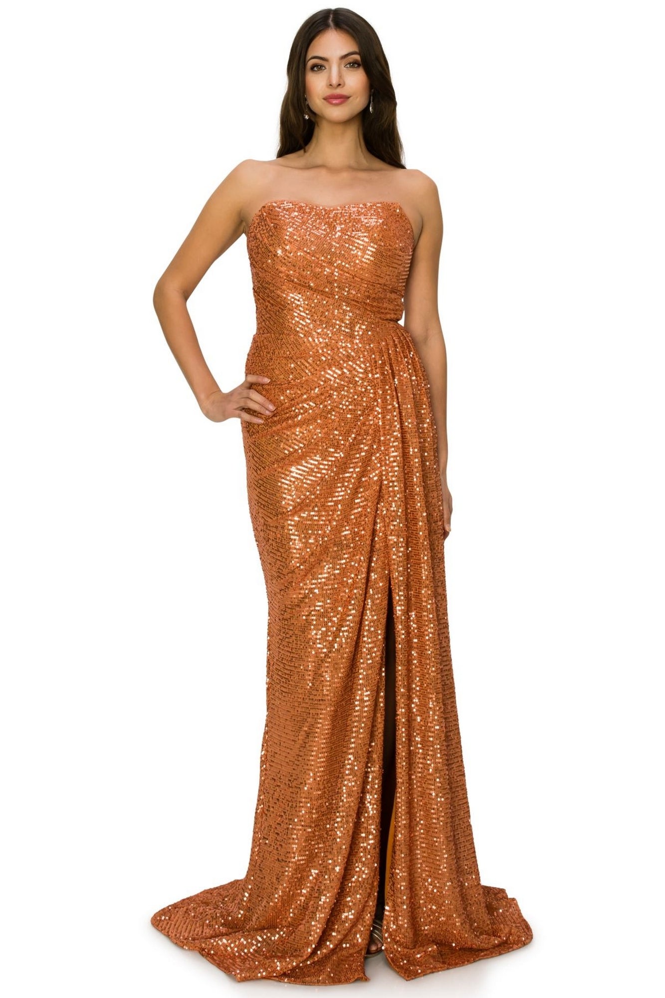 A woman models the Allover-Sequin Long Strapless Prom Dress 8052J in vibrant orange, standing with one hand on her hip against a plain white background.