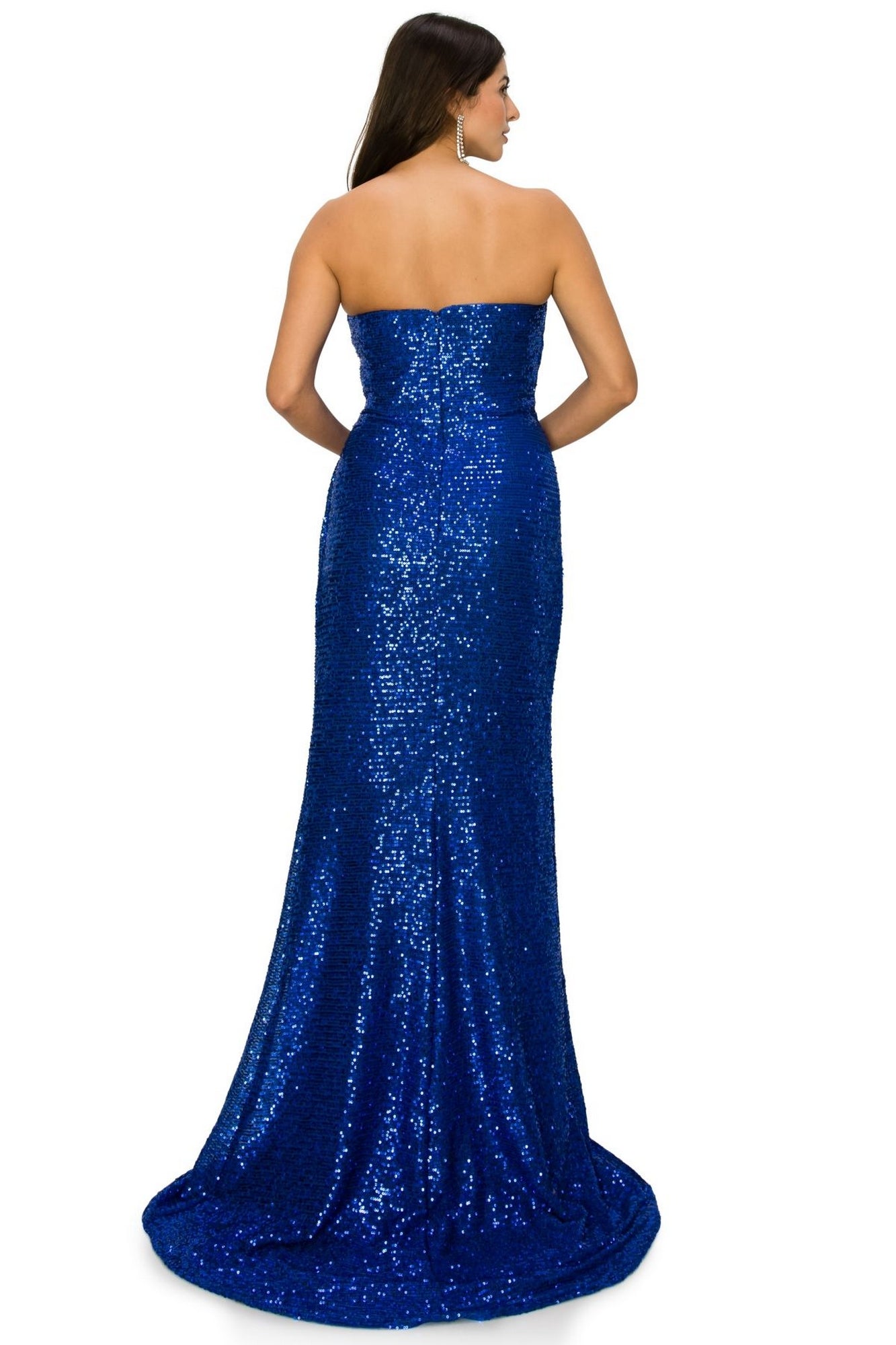 A woman models the Allover-Sequin Long Strapless Prom Dress 8052J, floor-length and royal blue, shown from the back with her hair down and hands on her hips.