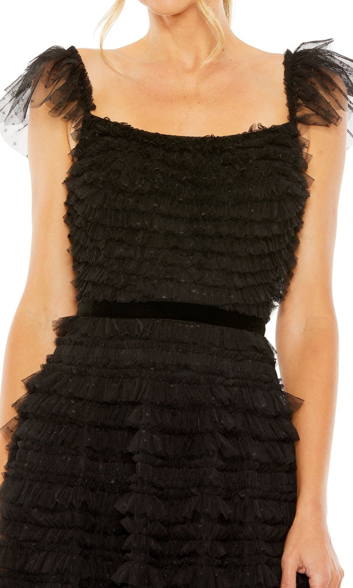 A woman wearing the Mac Duggal 8054 Midi Wedding Guest Dress, a sleeveless black dress with layered ruffles and sheer ruffled shoulder straps—perfect as a chic tea-length party outfit.