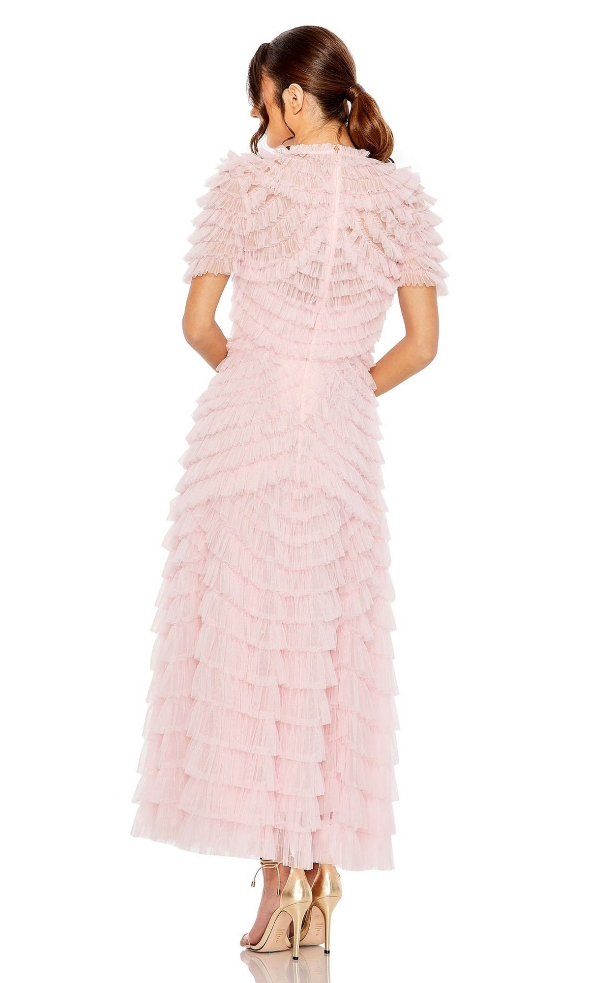 Woman stands with her back to the camera, wearing the pastel ruffled Midi Wedding Guest Dress 8055 by Mac Duggal and metallic heels—an ideal chic choice for wedding guests.