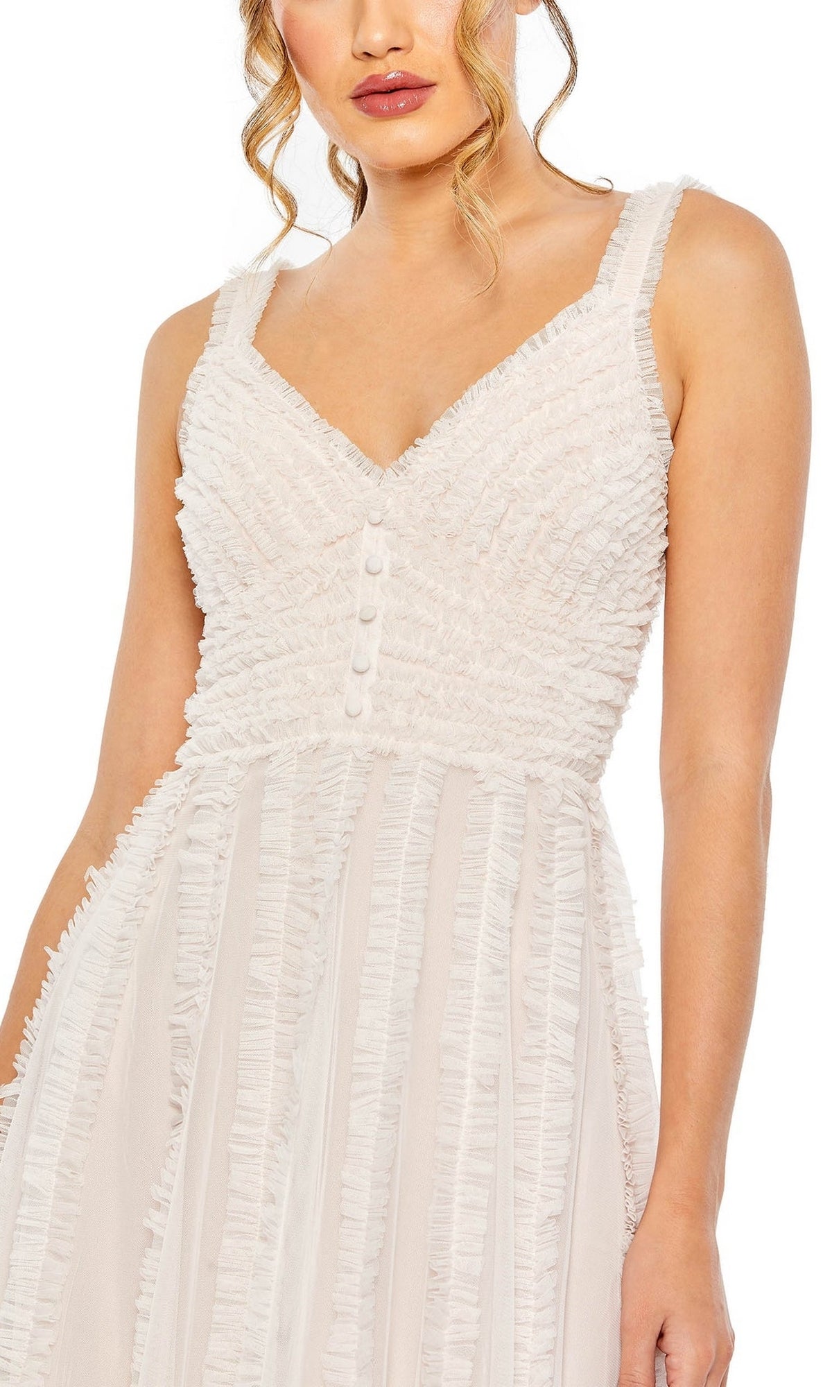 A woman wears the Mac Duggal 8056 Ruffled Midi Wedding Guest Dress—sleeveless, textured white with V-neck, buttoned bodice, and vertical/horizontal ruffles—ideal for semi-formal parties or as an elegant tea-length wedding guest look.