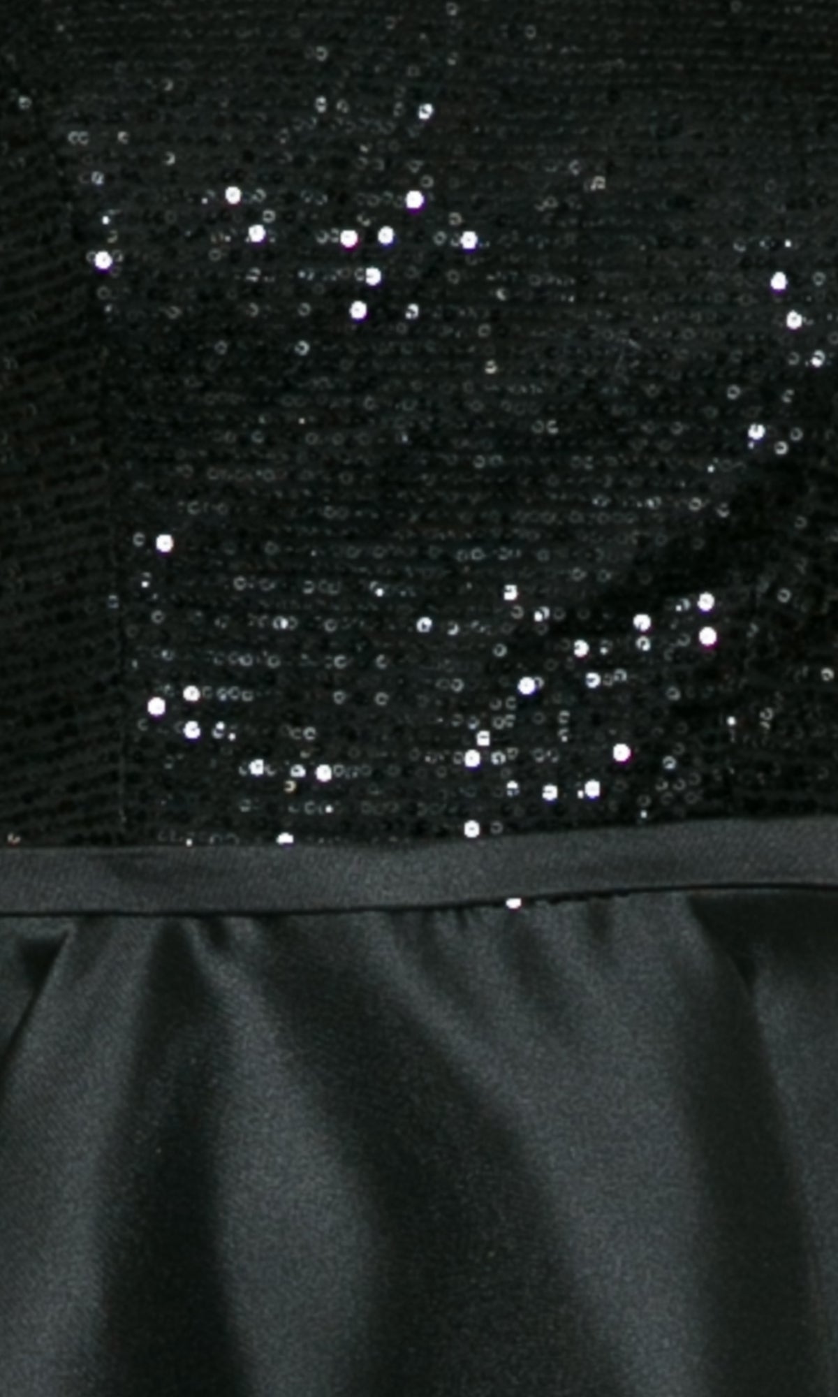 Close-up of the Cap-Sleeve Short A-Line Homecoming Dress 8732, featuring a black sequined bodice and sleek satin-like skirt—an ideal choice for your next party or homecoming.
