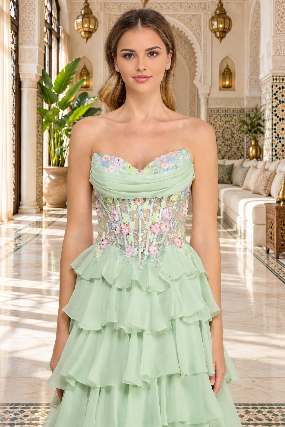 Amelia Couture 9103 strapless mint green gown featuring a beaded corset bodice, floral embroidery, and a tiered ruffled chiffon skirt.